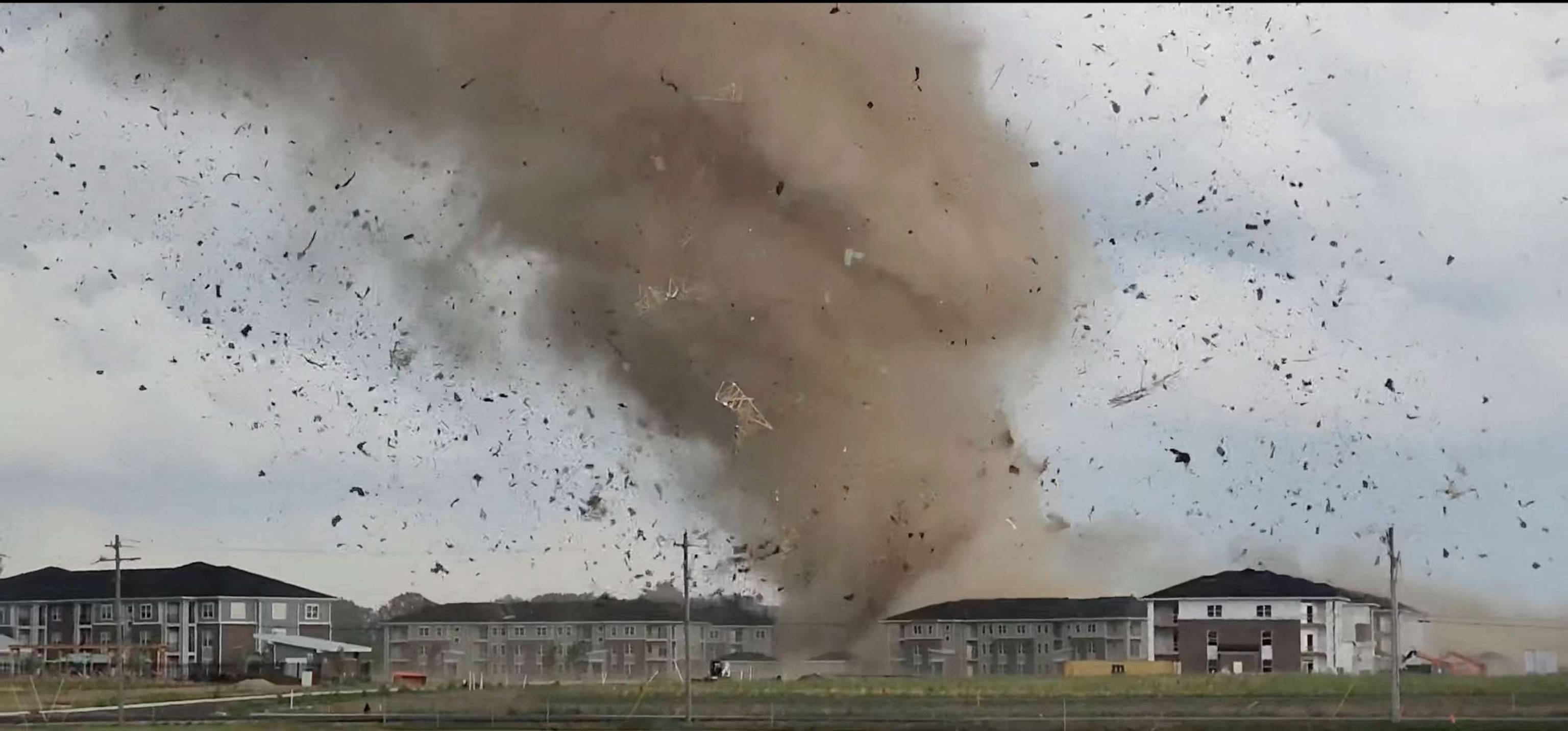 PHOTO: Debris is lifted into the air by a possible tornado during severe weather near Greenwood, Indiana, on June 25, 2023, as seen in this screen grab obtained from a social media video.