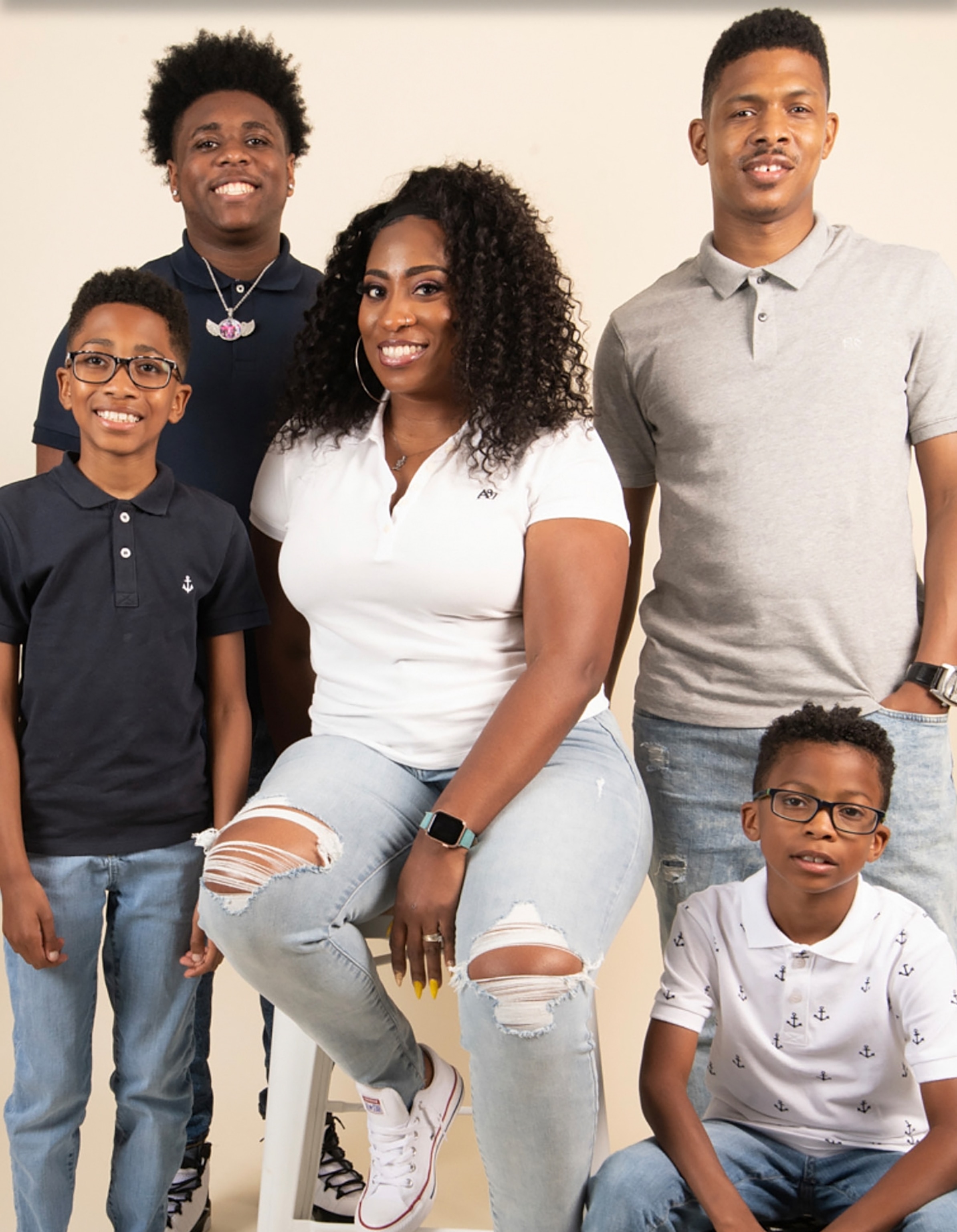 PHOTO: Marvin Burton, Jr. poses for a photo this year with his wife and three sons.