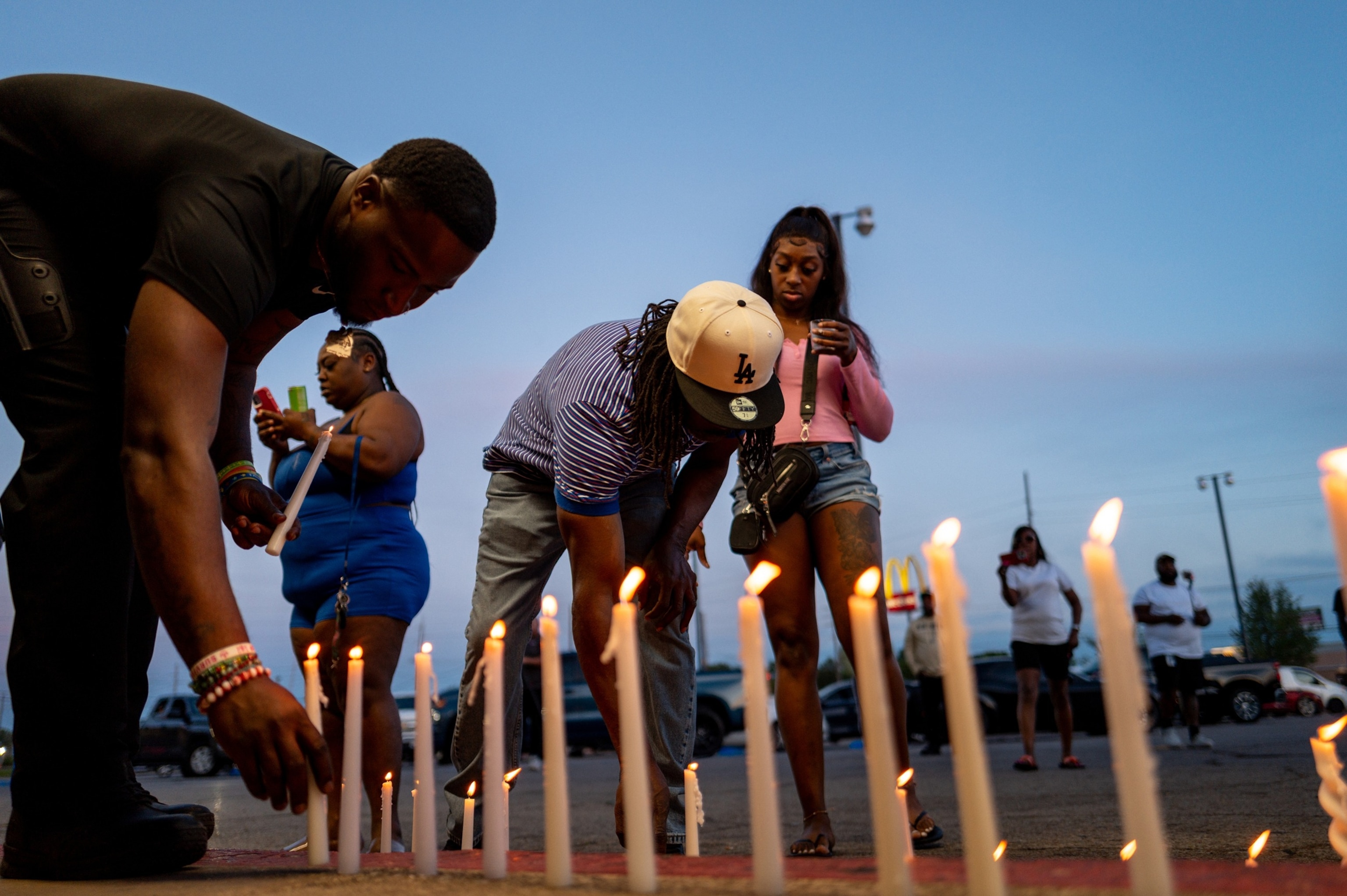 PHOTO: People attend a candlelight vigil, April 19, 2026, in Shreveport, Louisiana, where eight children were killed and two women were wounded during a domestic violence incident, according to local authorities.