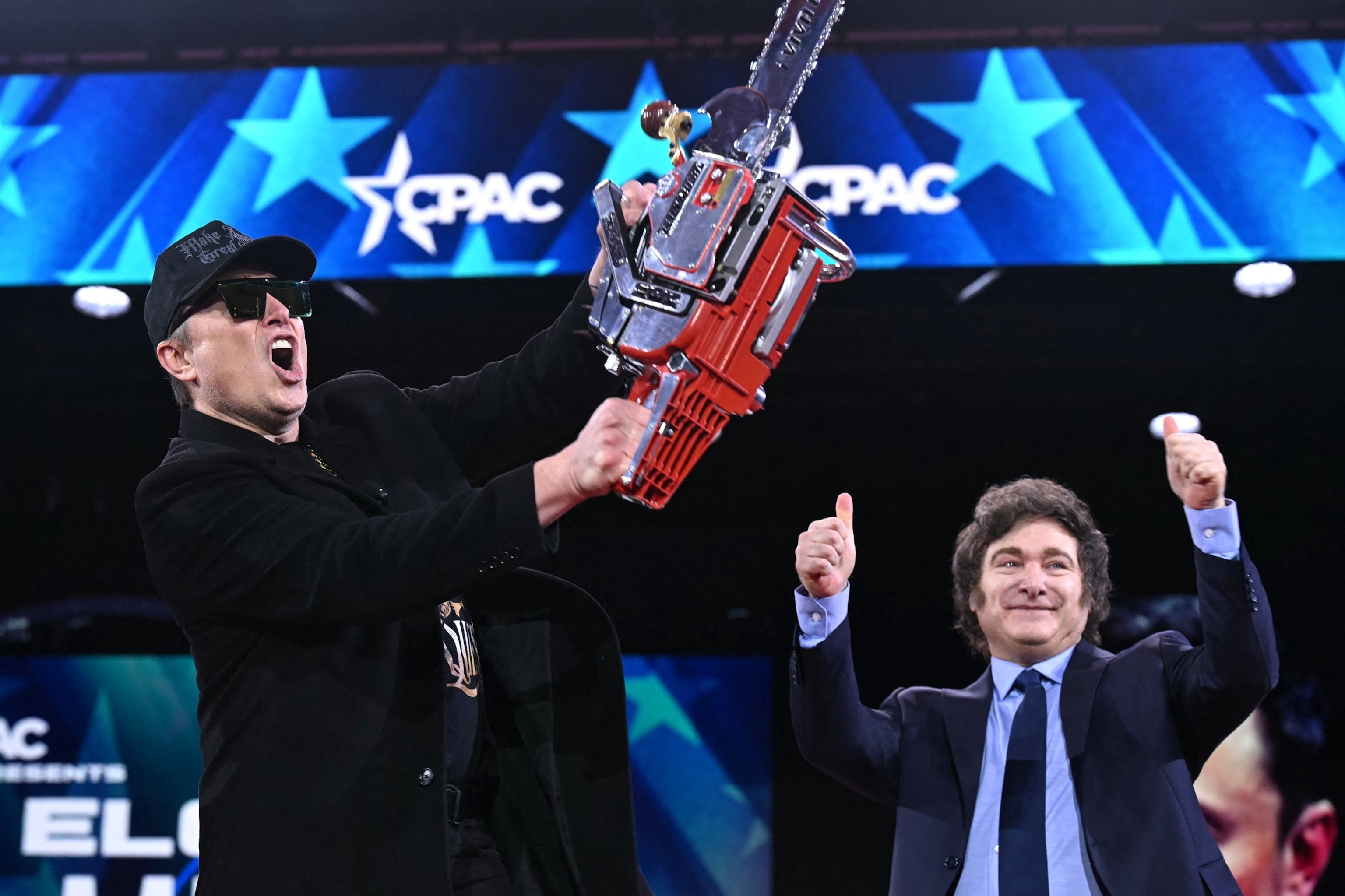 PHOTO: In this Feb. 20, 2025, file photo, Elon Musk holds a chainsaw alongside Argentine President Javier Milei during the annual Conservative Political Action Conference (CPAC) in Oxon Hill, Maryland.
