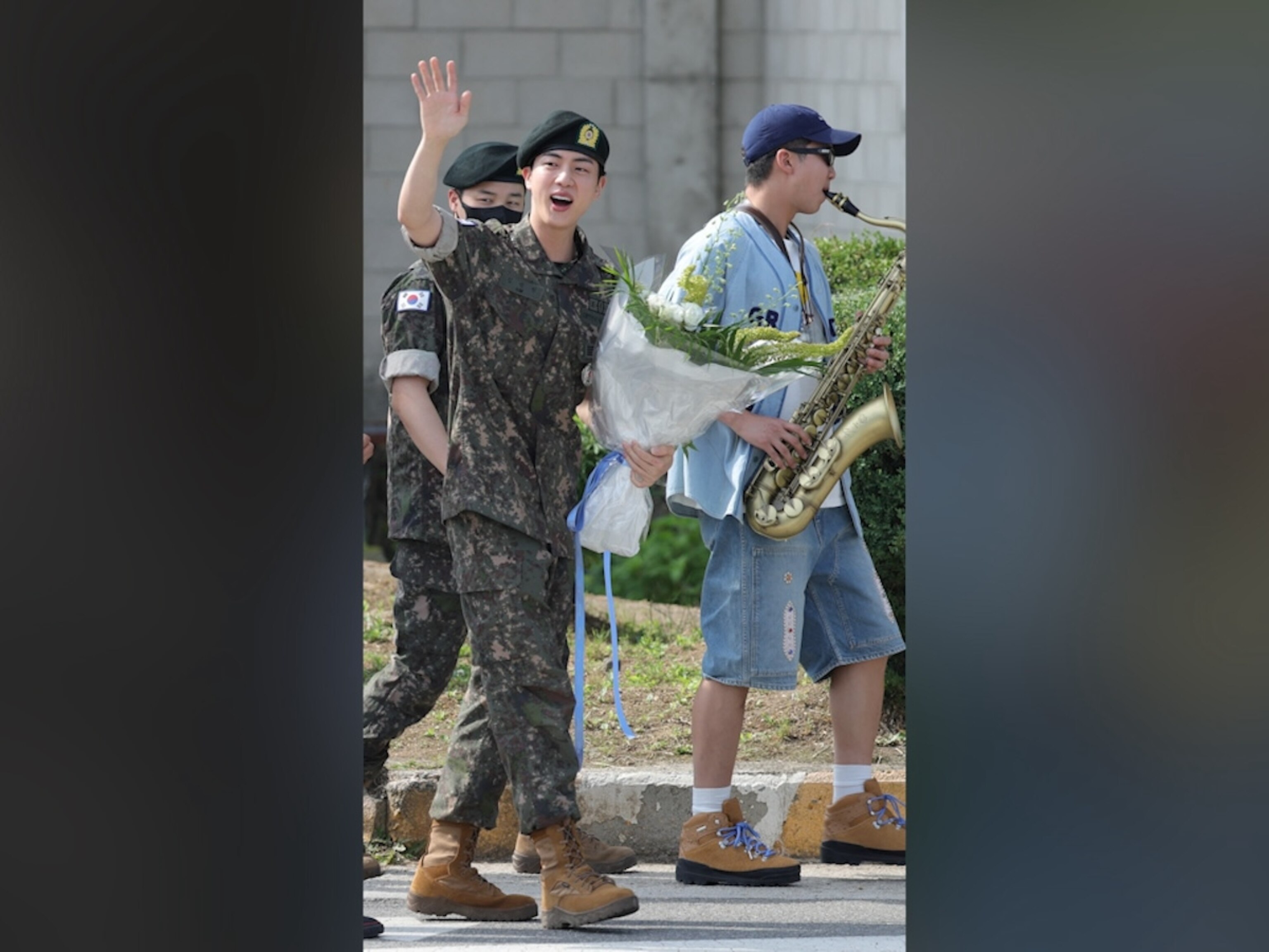 Video BTS members embrace bandmate Jin after he's discharged from