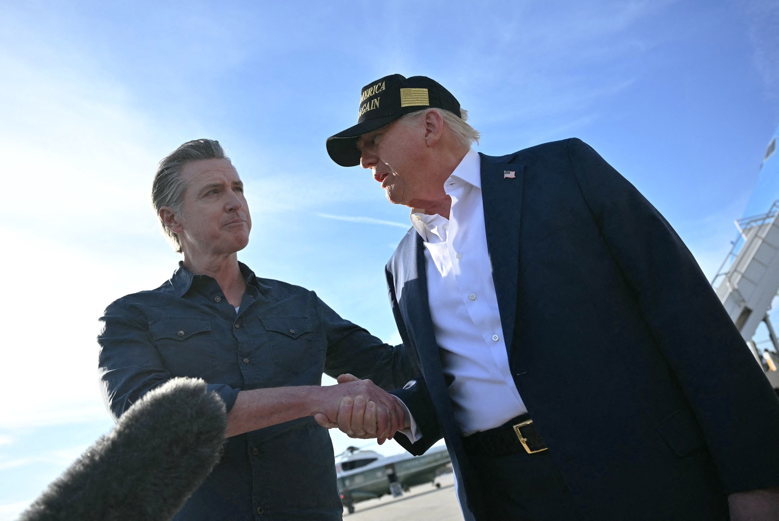 PHOTO: In this Jan. 24, 2025, fiile photo, President Donald Trump shakes hands with California Governor Gavin Newsom upon arrival at Los Angeles International Airport to visit the region devastated by the Palisades and Eaton fires.