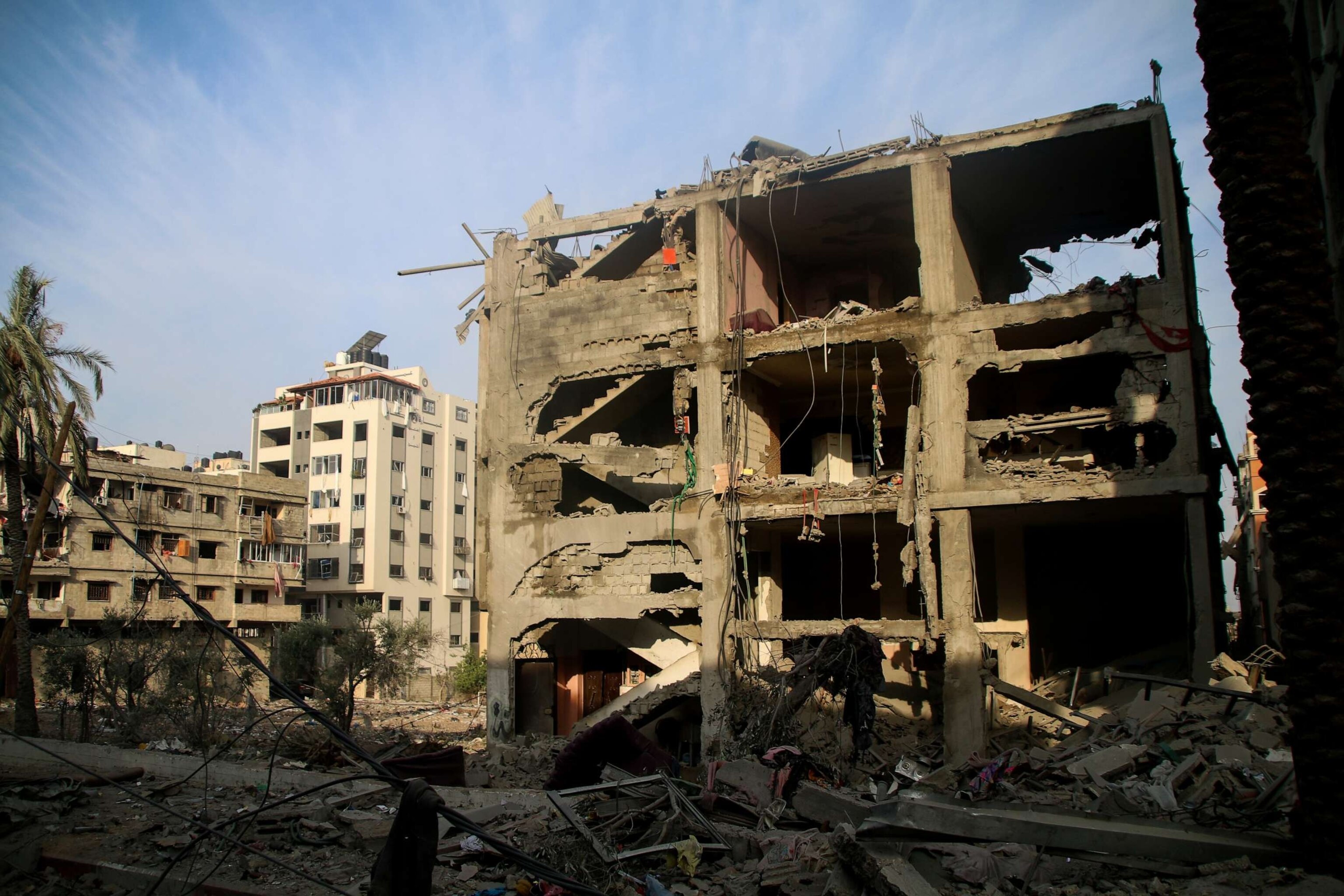 PHOTO: People inspect damage to their homes caused by Israeli airstrikes in the Karama area, northern Gaza Strip Oct. 11, 2023.