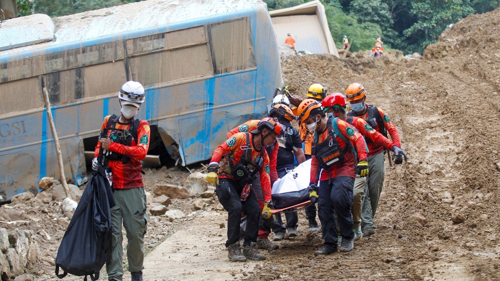 54 people are confirmed dead in a landslide that buried a gold-mining village in south Philippines