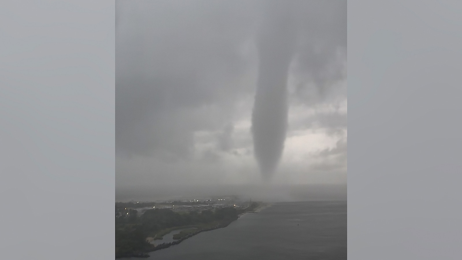 Multiple waterspouts, tornadoes over water, were reported in Queens and Long Island, New York Thursday night.