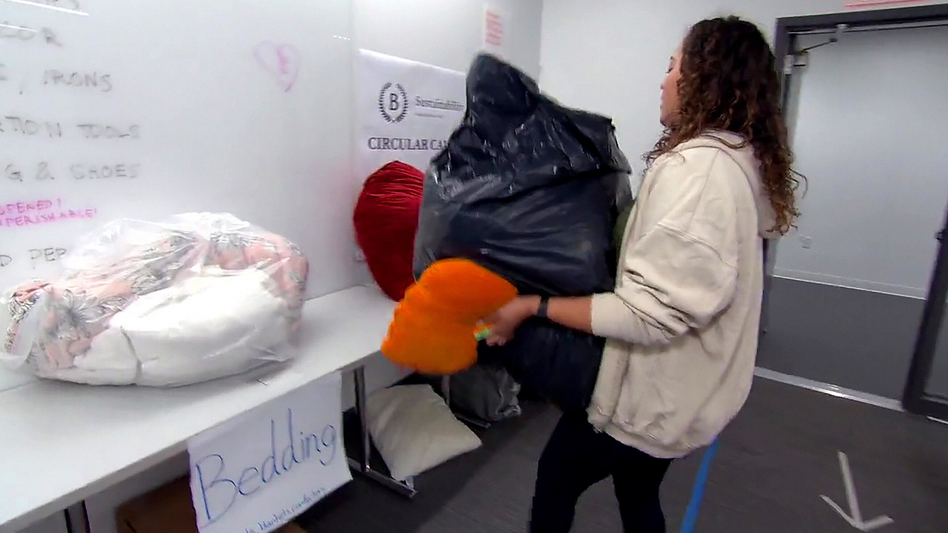 PHOTO: Barnard College students sort through used dorm items