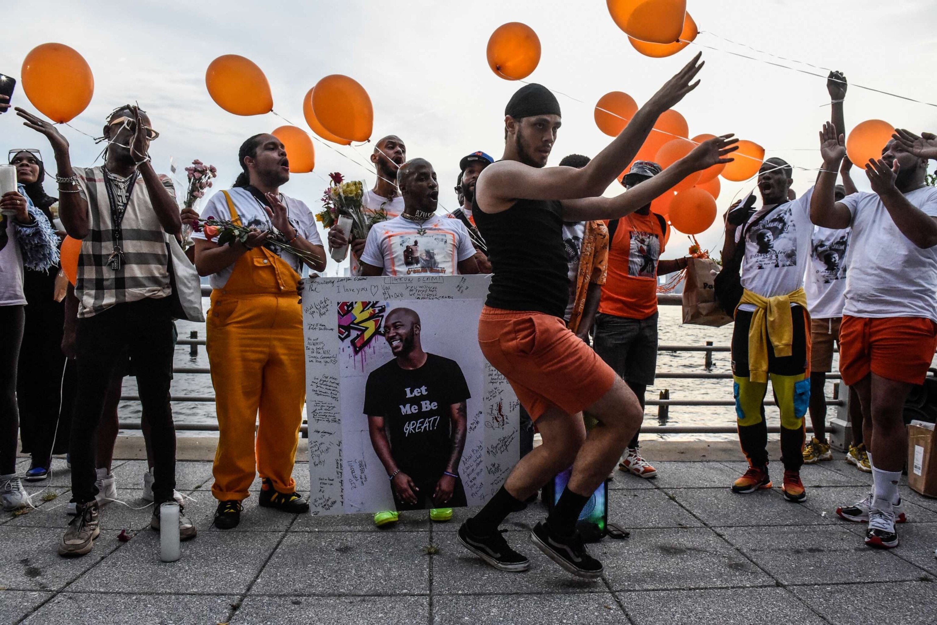 PHOTO: People vogue in front of a makeshift memorial for O'Shae Sibley on Aug. 5, 2023 in New York City.