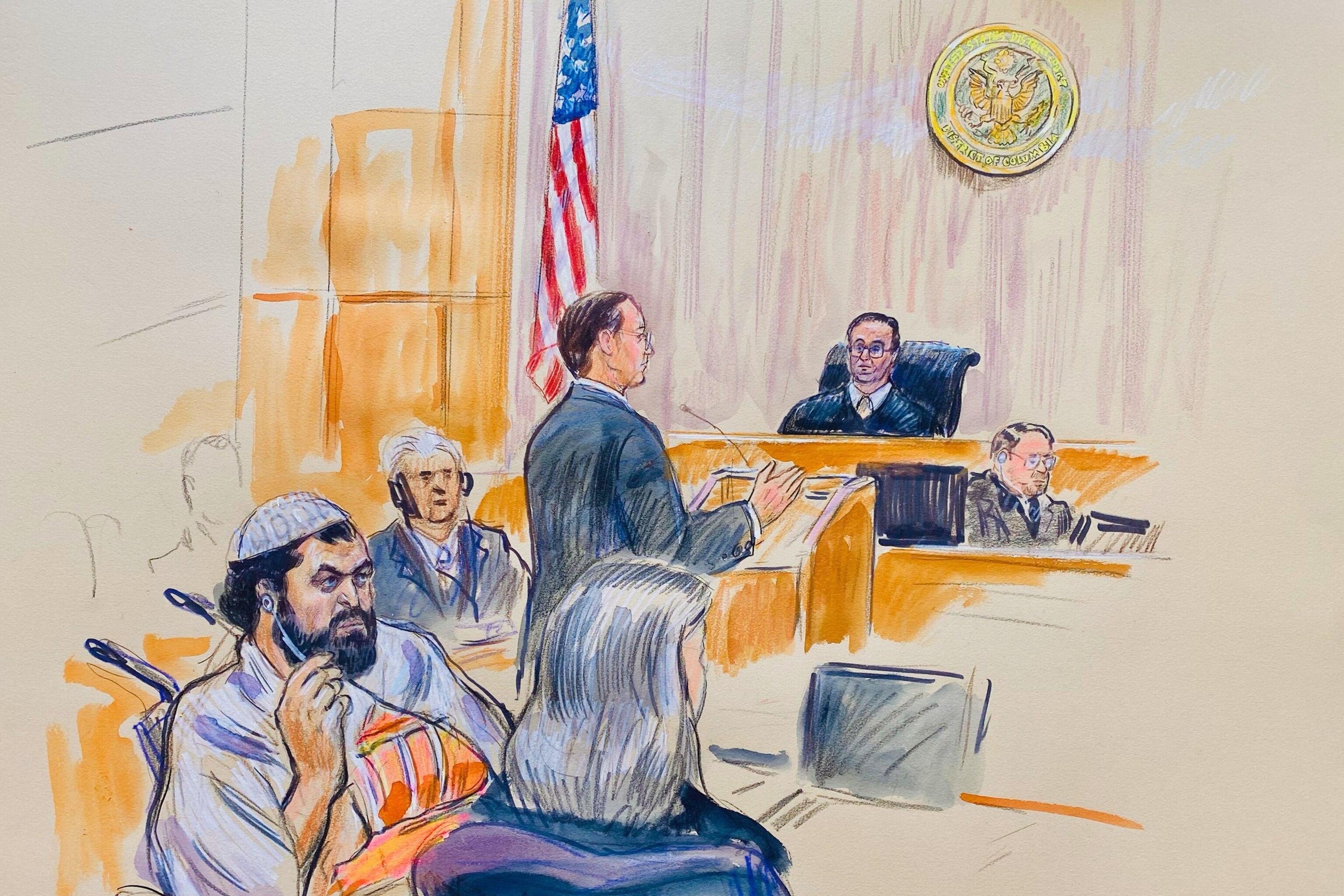 PHOTO: This courtroom sketch depicts Rahmanullah Lakanwal, before U.S. District Judge Amit Mehta, Feb. 4, 2025 at Federal Court in Washington, as Assistant U.S. Attorney Christopher Tortorice speaks at the podium.