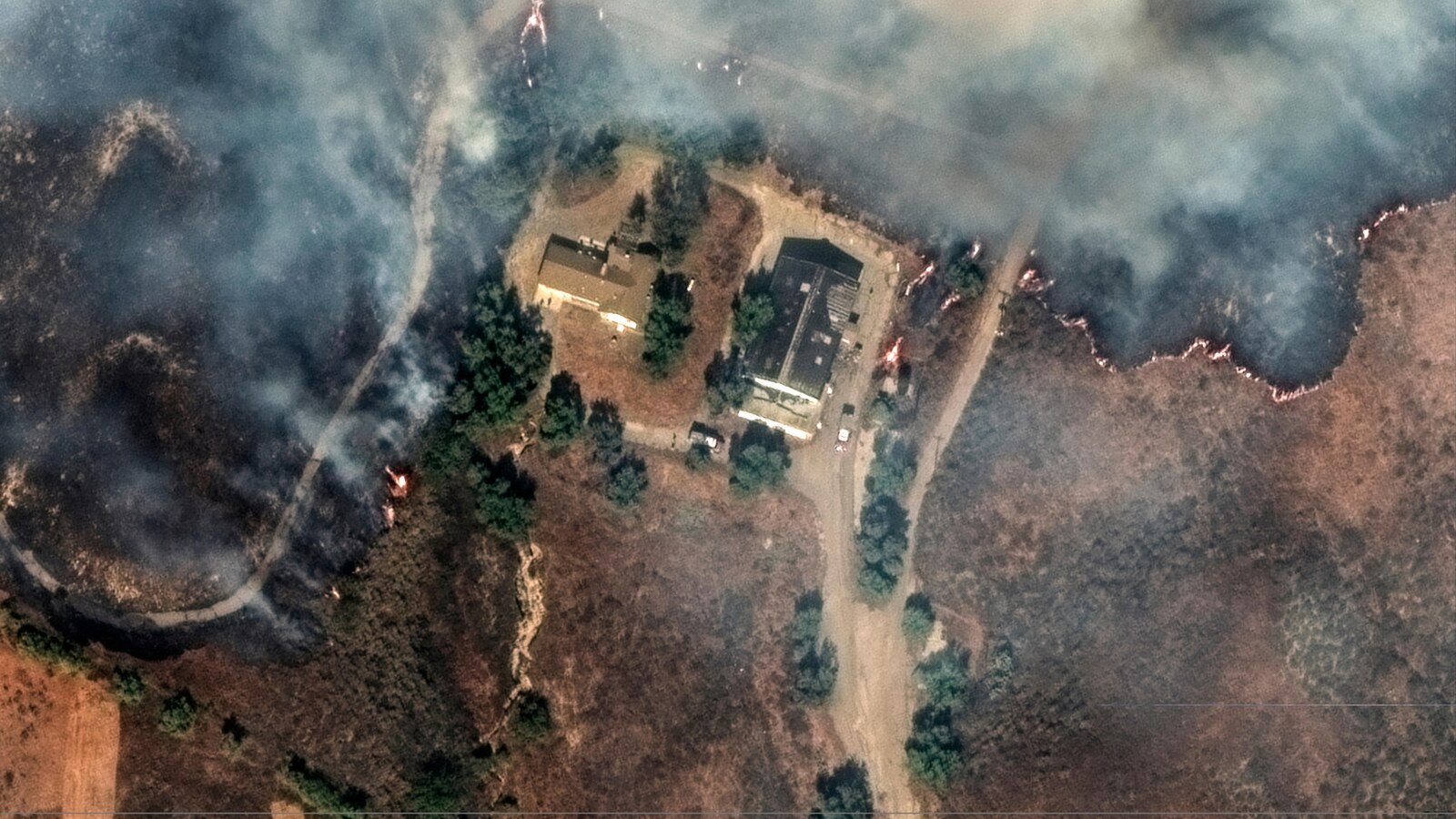 Southern California firefighters make progress against wildfire as fierce winds start to subside