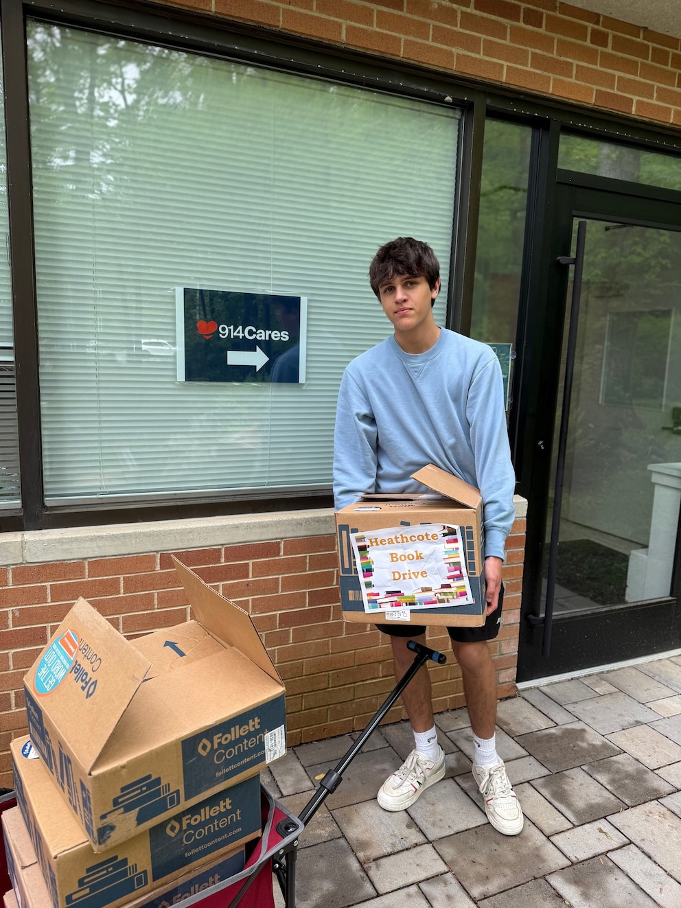 PHOTO: Spring 2025, Max Spencer, Westchester, NY (donating books through his organization The Inspiration Project).