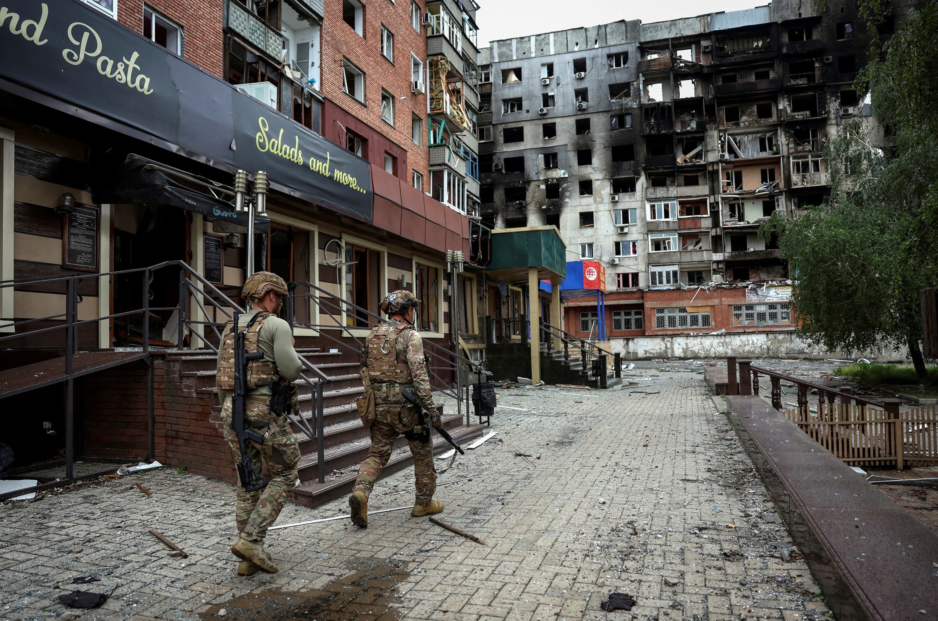 Ukrainian police officers check an area for residents in the frontline town of Pokrovsk in Donetsk region, Ukraine, on May 21, 2025. Anatolii Stepanov/Reuters