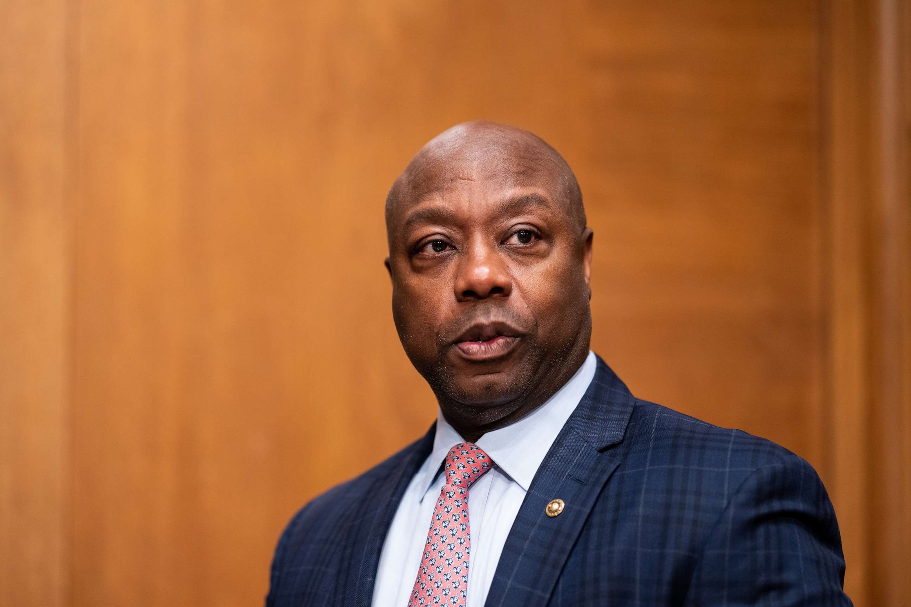 PHOTO: Sen. Tim Scott arrives for the Senate Banking, Housing, and Urban Affairs Committee hearing on 