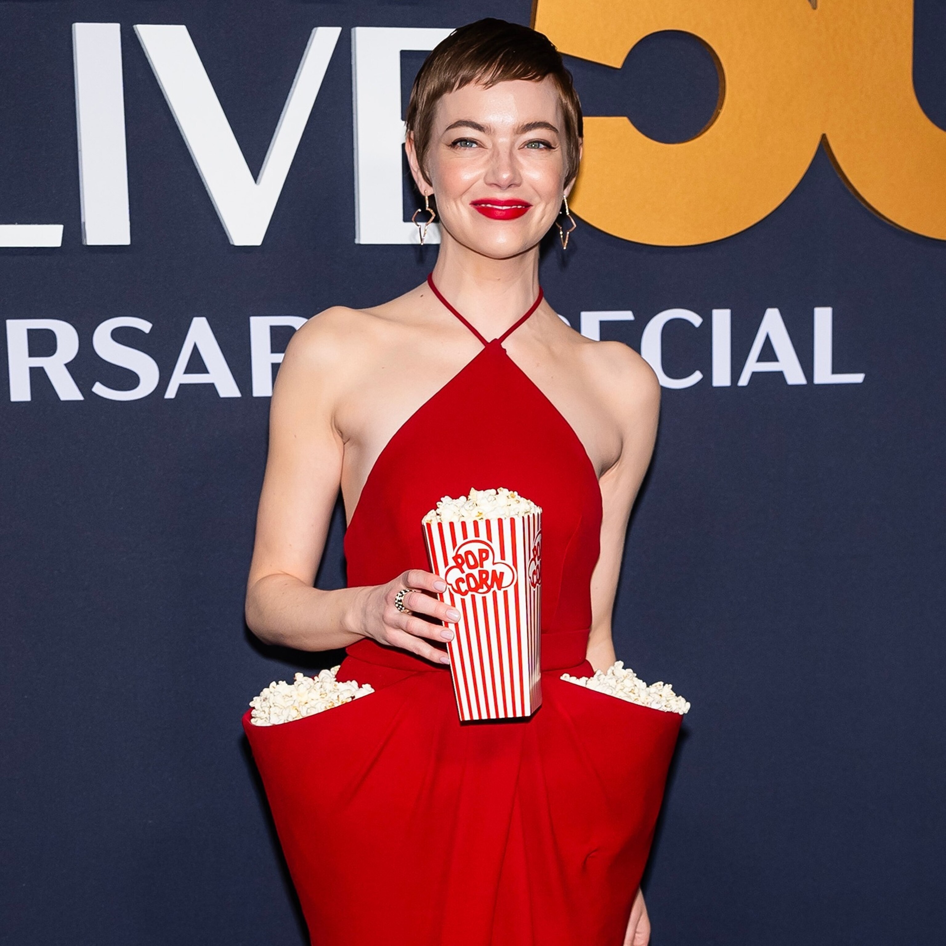 Emma Stone turns heads in popcorn-pocketed Louis Vuitton dress