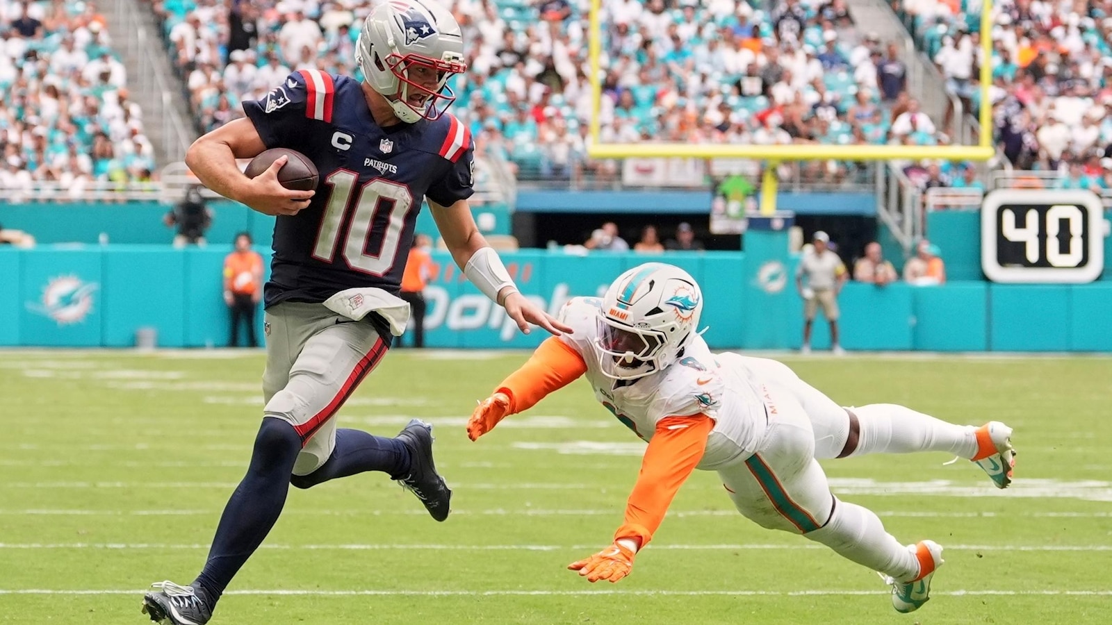 Maye accounts for 3 TDs and Patriots top Dolphins 33-27 for Vrabel’s 1st win as New England coach