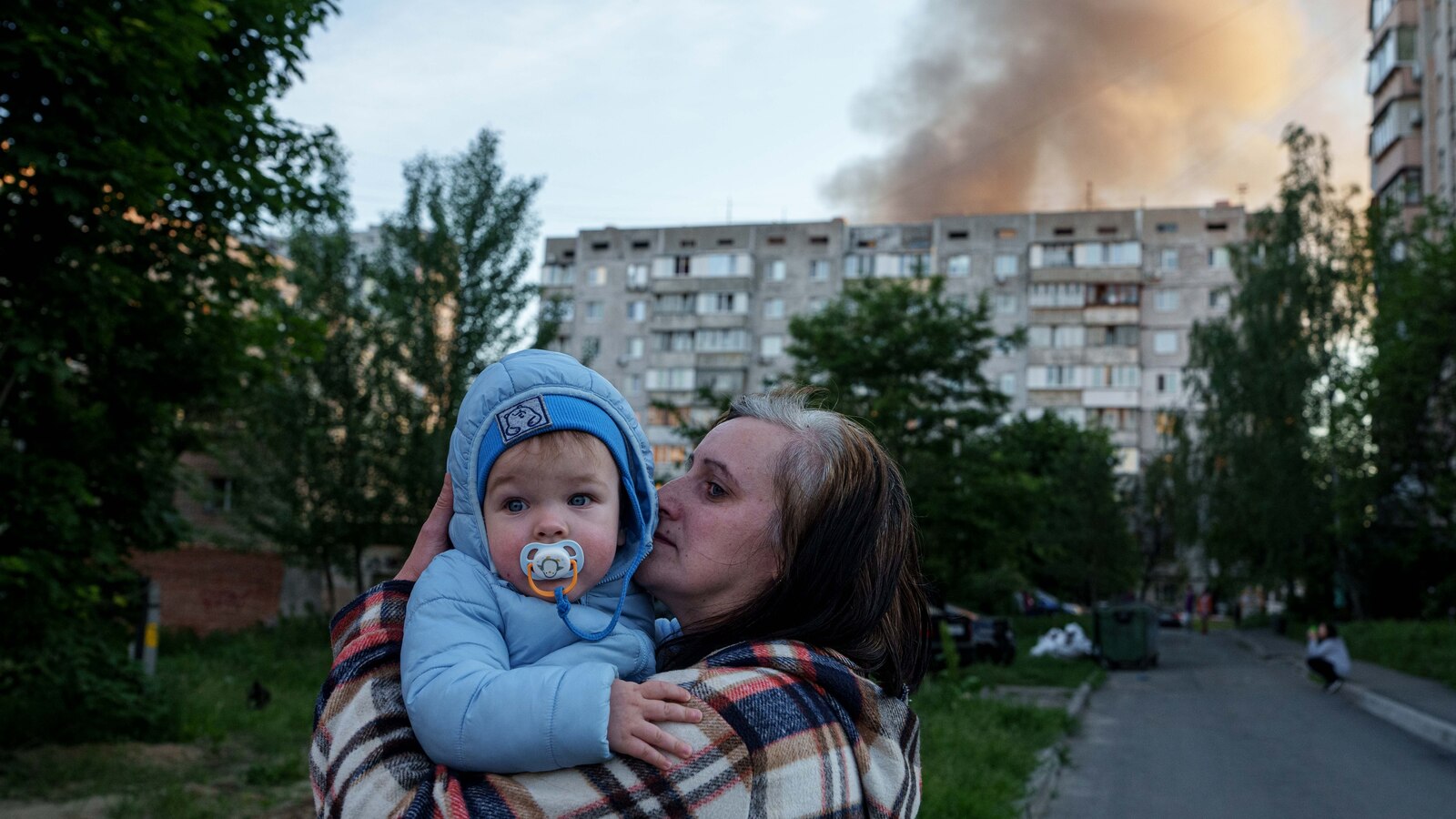 Russian attack on Ukraine kills at least 11 and traps others in damaged buildings