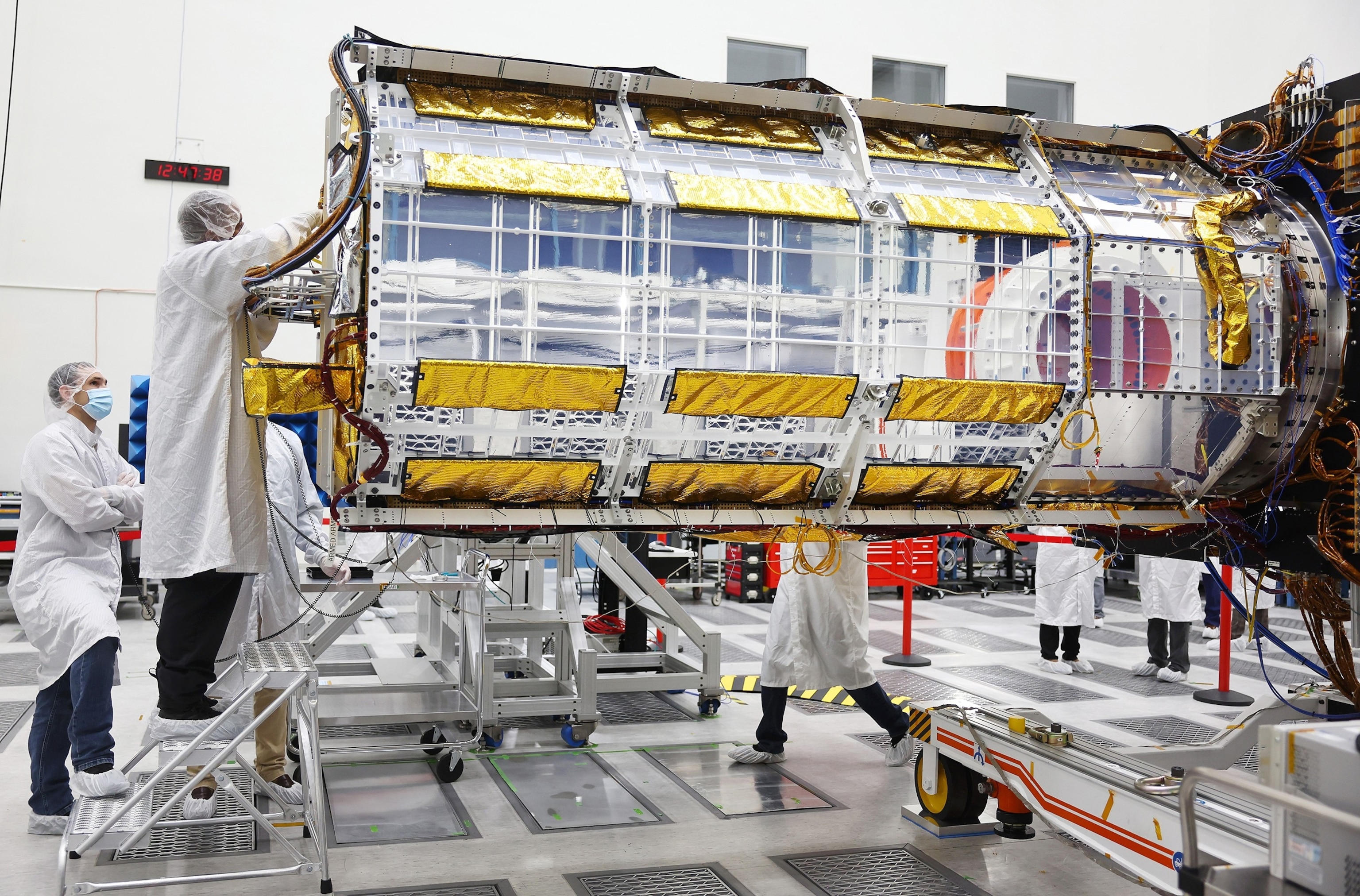 PHOTO: Clean room engineers and technicians prepare the scientific core of the NASA-ISRO Synthetic Aperture Radar (NISAR) satellite inside a Spacecraft Assembly Facility clean room at NASA's Jet Propulsion Laboratory, Feb. 3, 2023 in Pasadena, California.