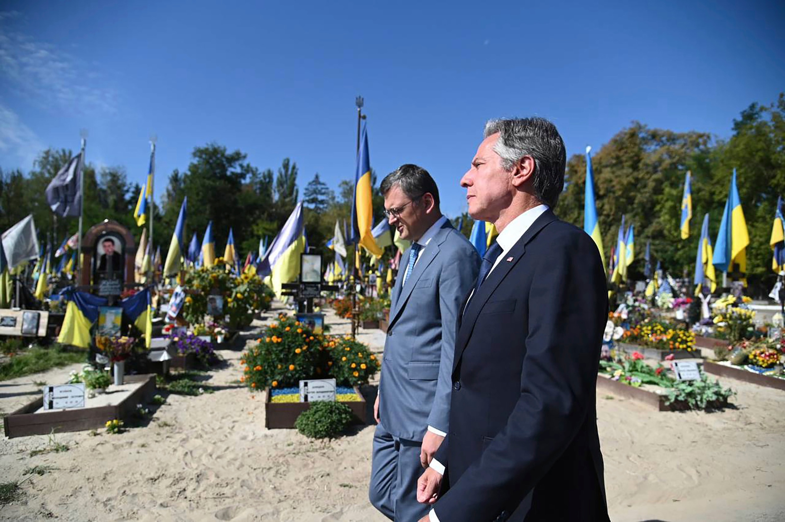 PHOTO: In this photo provided by Ukrainian Ministry of Foreign Affairs, U.S. Secretary of State Antony Blinken, right, and Ukrainian Foreign Minister Dmytro Kuleba, walk at the Alley of Heroes at the Berkovetske cemetery in Kyiv, Sept. 6, 2023.