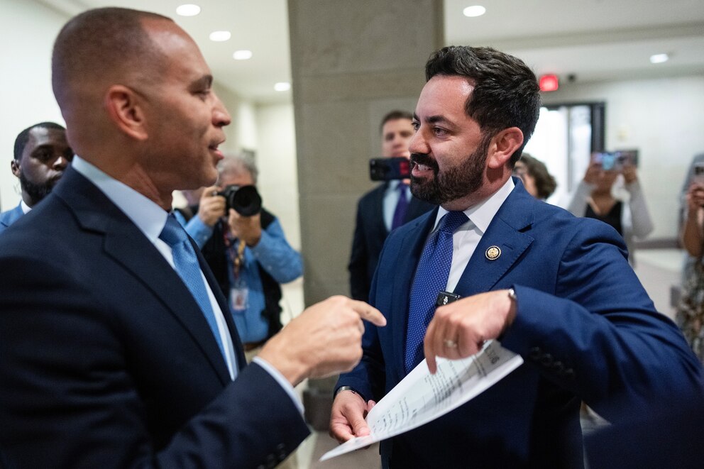 PHOTO: Rep. Mike Lawler, R-N.Y.,  right, confronts House Minority Leader Hakeem Jeffries, D-N.Y., about signing on to a bill that would extend Affordable Care Act tax credits, after a House Democrats news conference Washington, D.C., October 8, 2025. 