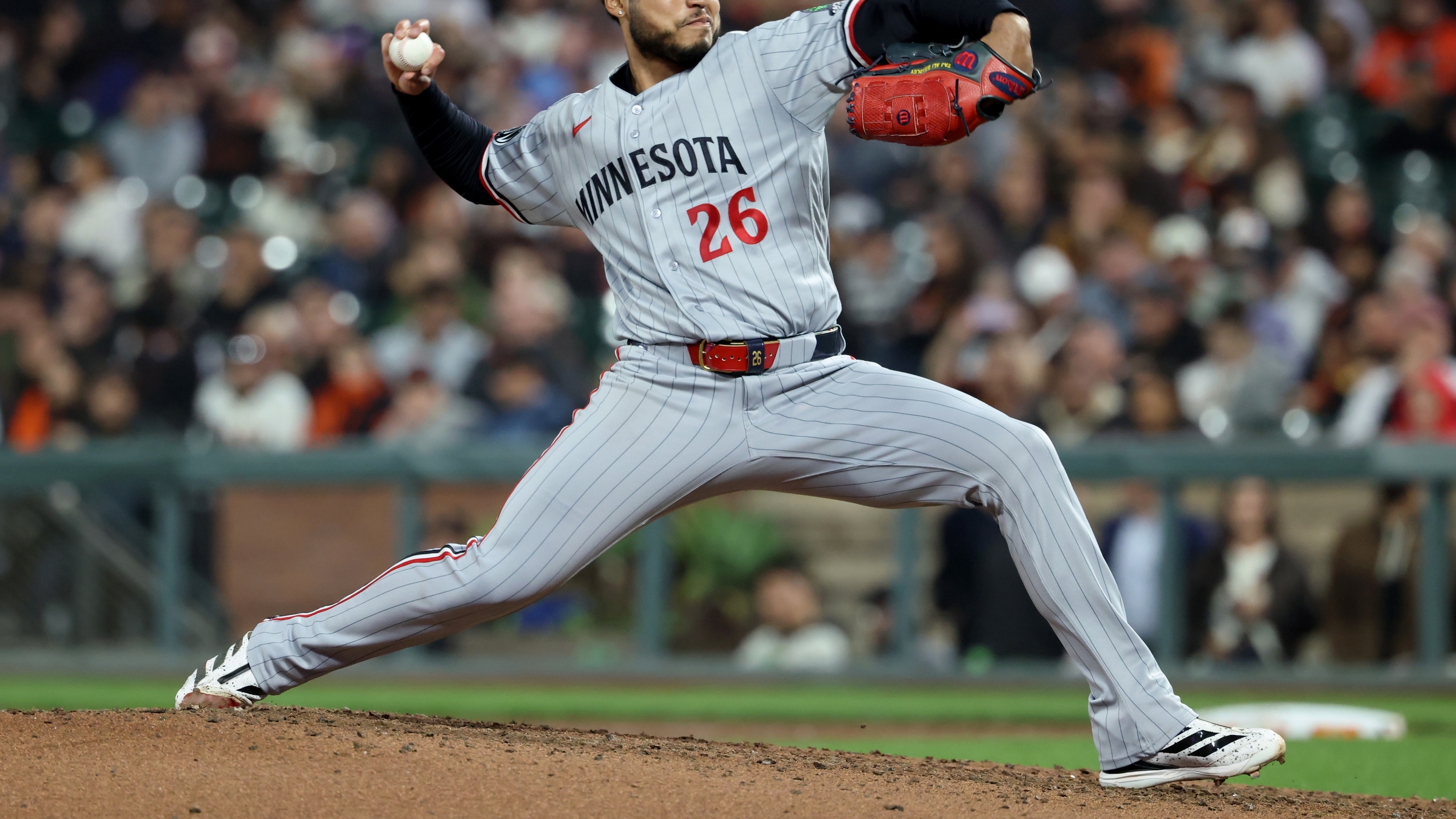 Bradley passes 200 strikeouts, pitches Twins to 3-2 win over