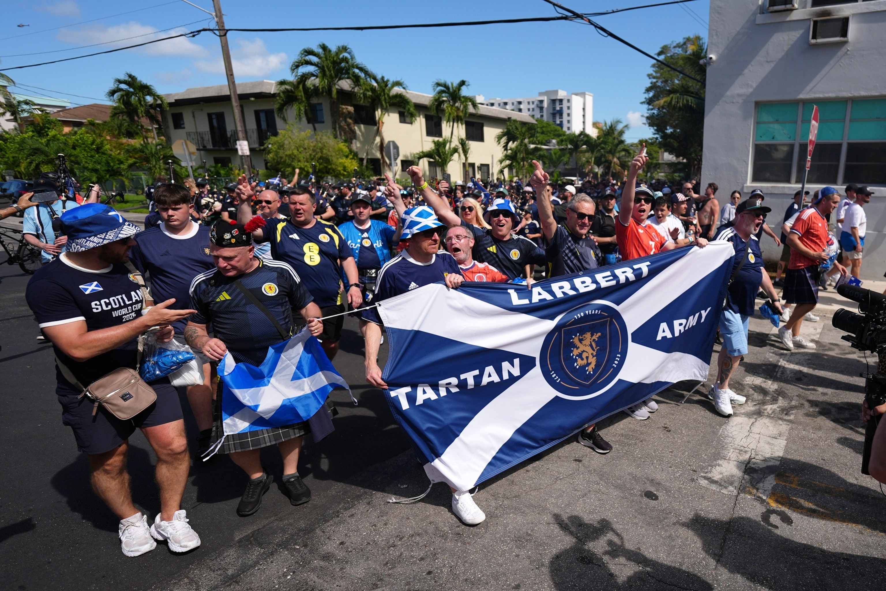 PHOTO: Scotland soccer fans march with the Tartan Army from Miami's Little Havana neighborhood on their way to watch a Miami Marlins baseball game, on June 22, 2026.