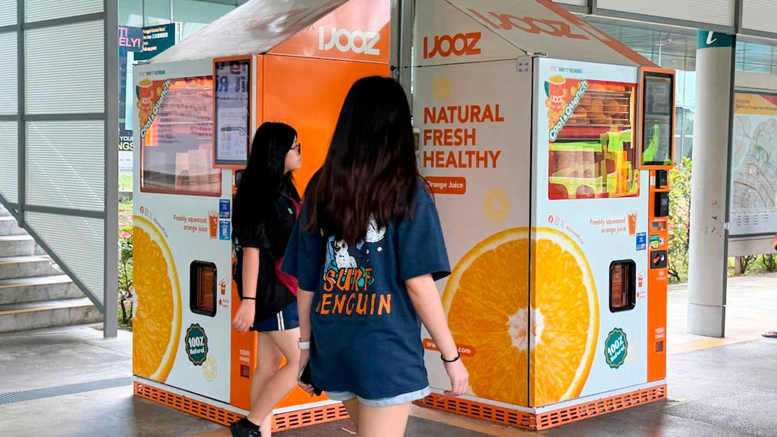 French teen charged in Singapore over a vending machine straw-licking video