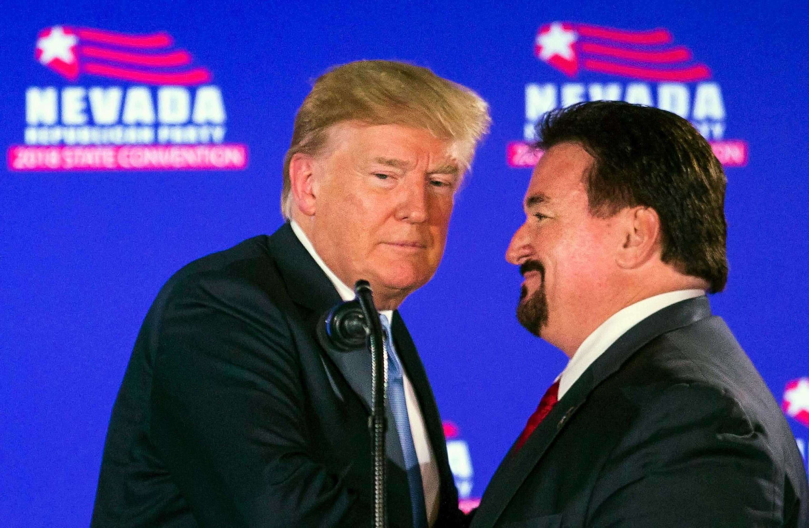 PHOTO: In this June 23, 2018, file photo, President Trump, left, is greeted by Nevada State GOP Chairman Michael McDonald as he arrives at the podium to speak during the Nevada Republican Party Convention at the Suncoast Hotel and Casino in Las Vegas.