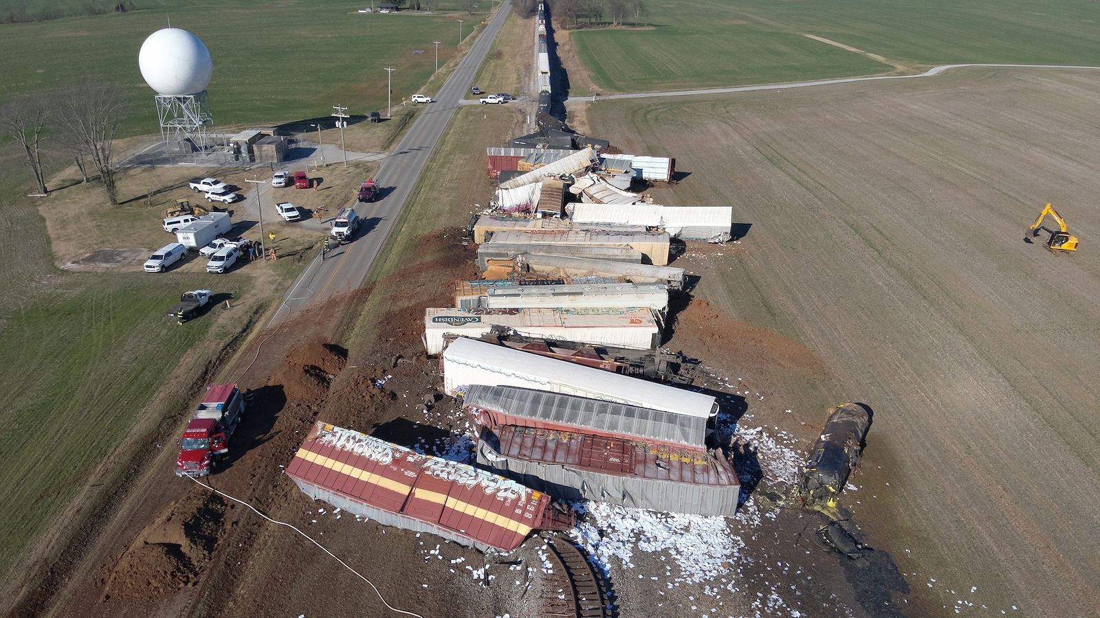 Derailed train in Kentucky causes a chemical leak and sparks a fire