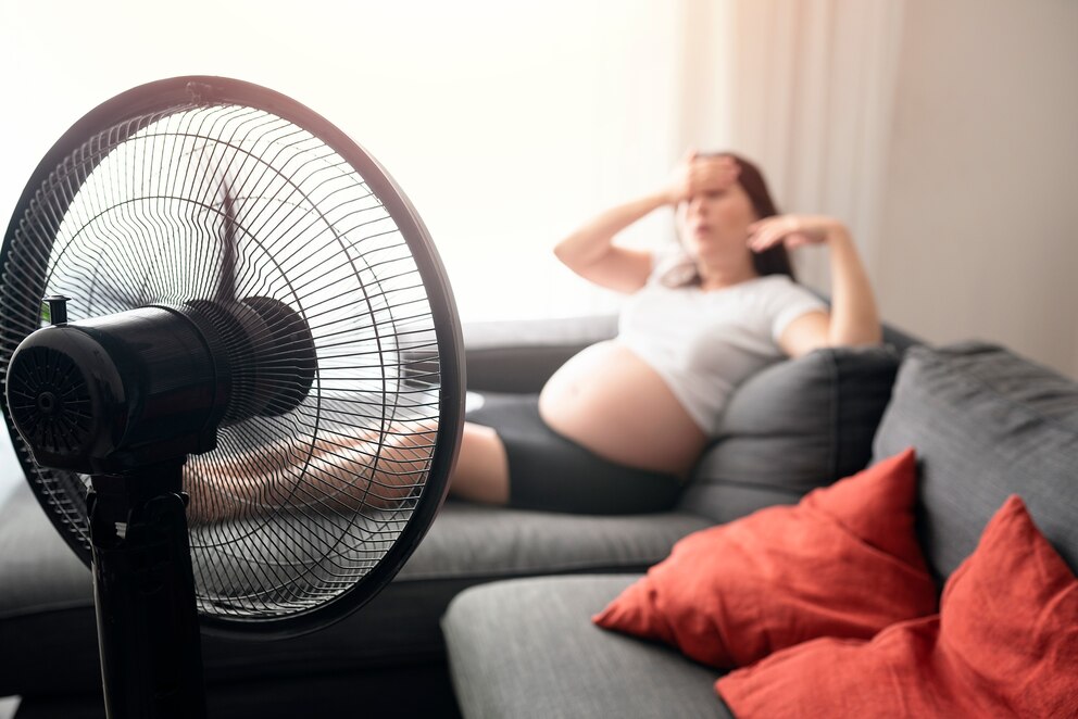 PHOTO: A pregnant woman in hot temperatures in an undated stock photo. 