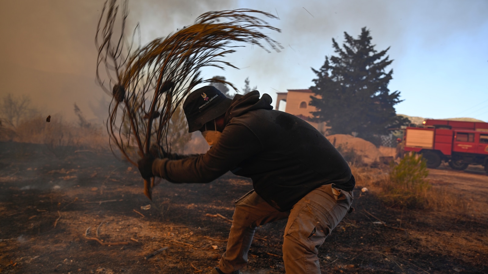 Water-dropping aircraft take off to tackle major Greek wildfire