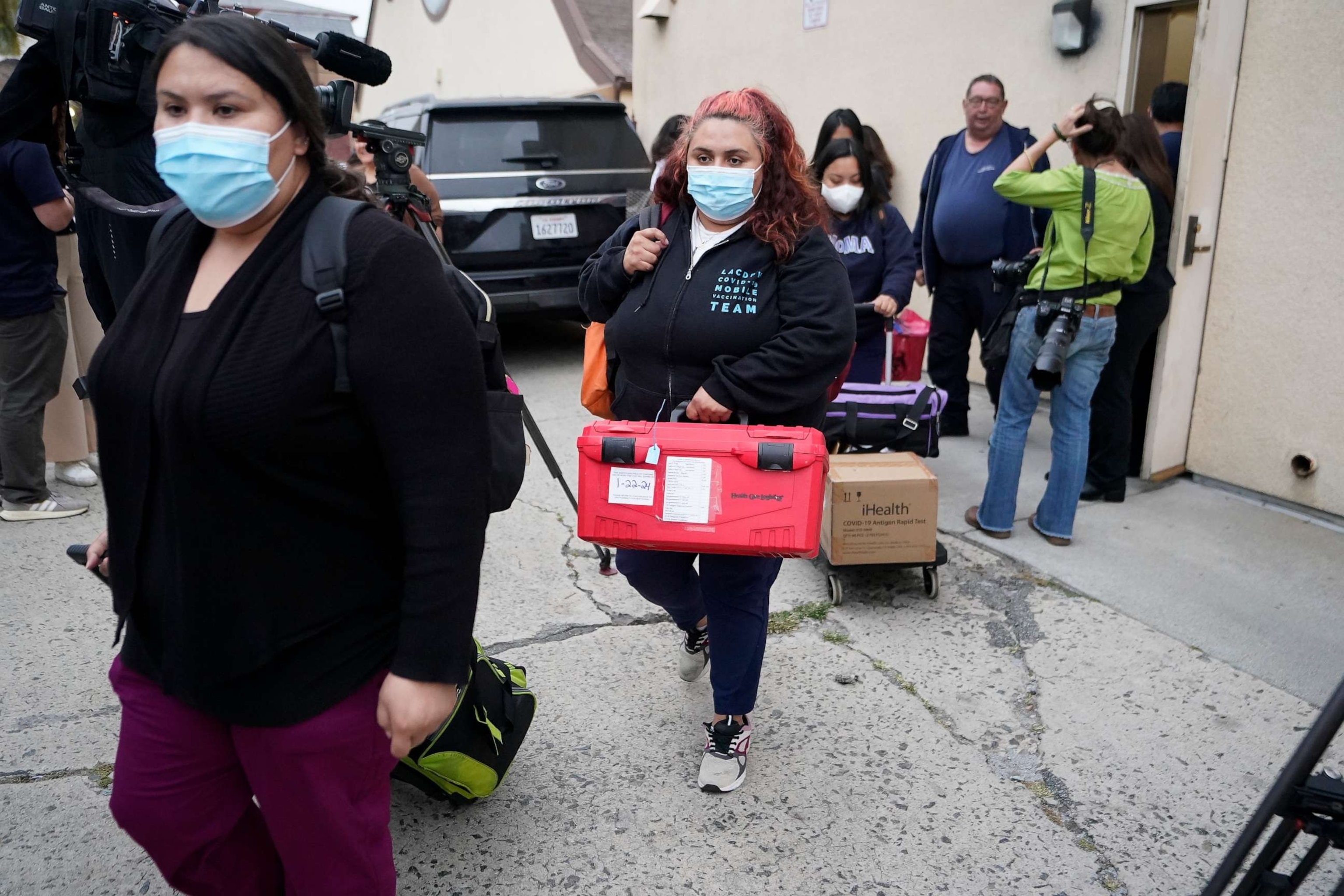 PHOTO: Los Angeles County Public Health Emergency Operations officials leave St. Anthony's Croatian Catholic Church after evaluating the newly arrived migrants being housed in Los Angeles on Wednesday, June 14, 2023.