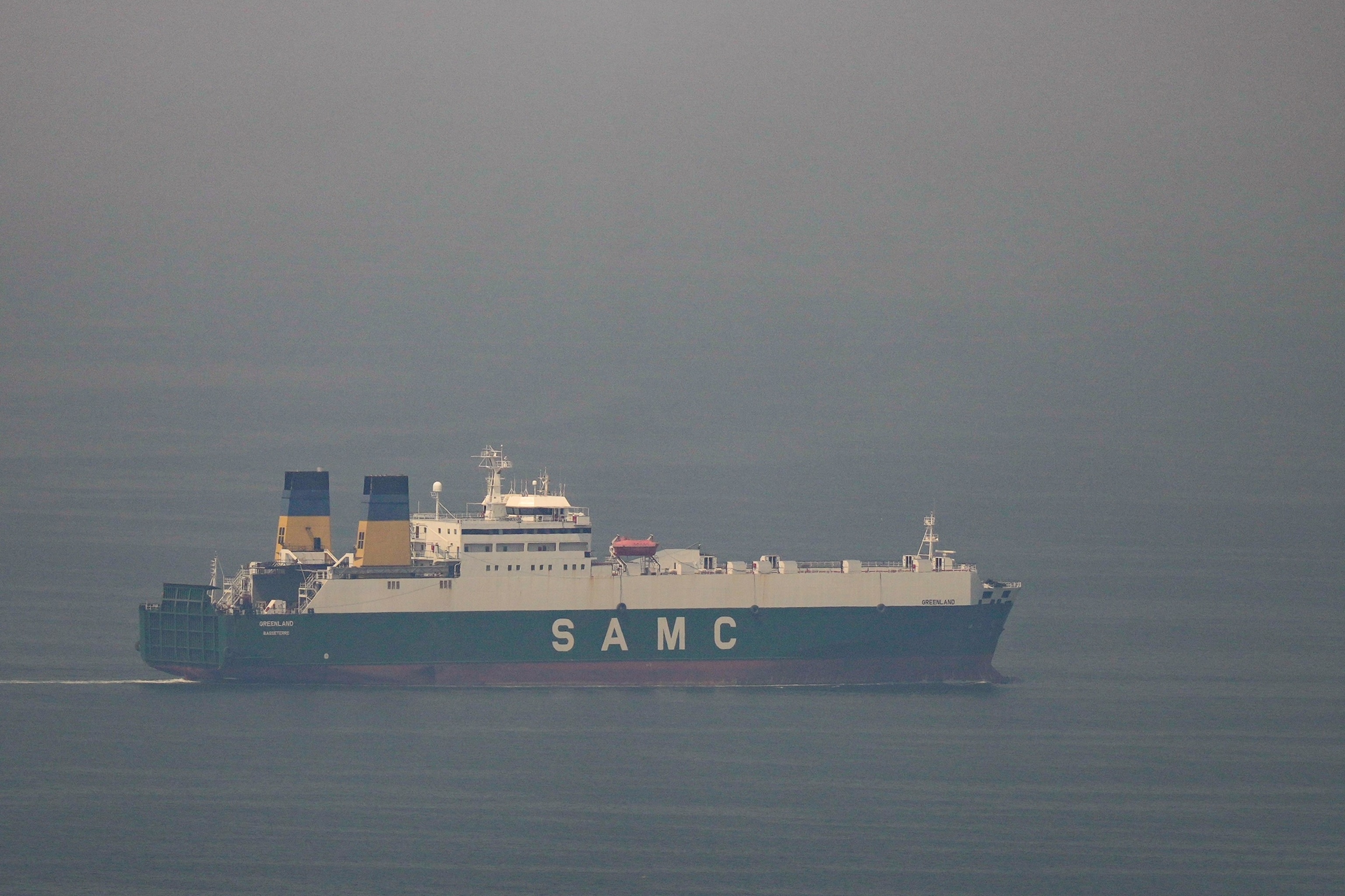 PHOTO: A cargo ship sails in the Arabian Gulf towards the Strait of Hormuz off the coast of the United Arab Emirates, March 15, 2026.