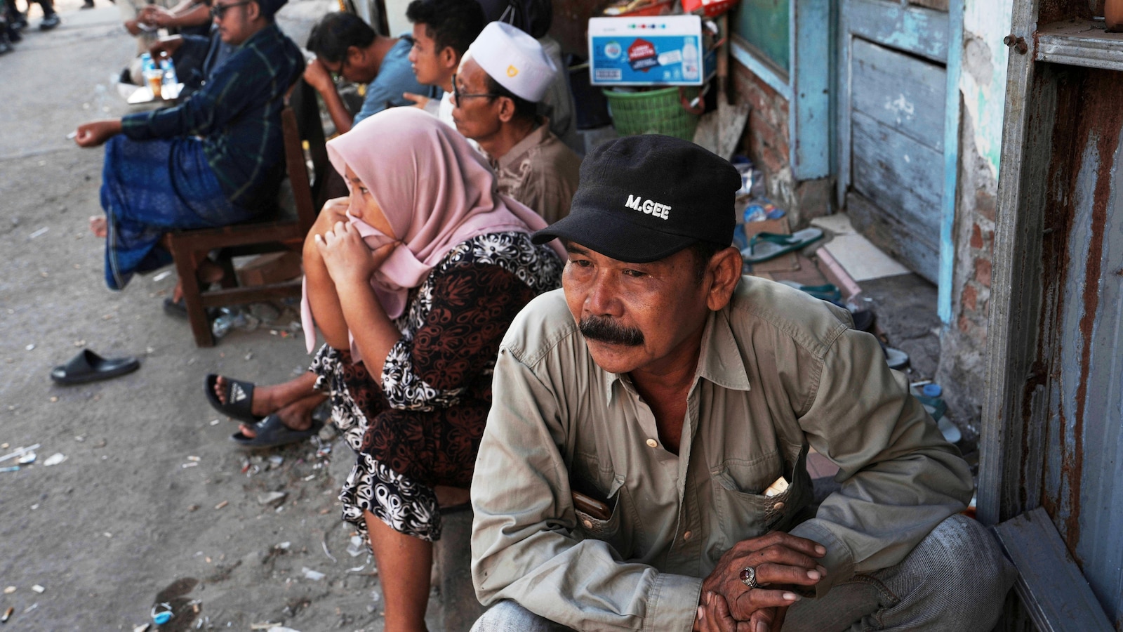 Rescuers turn to heavy machinery as hope fades of finding survivors of Indonesia school collapse