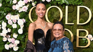 Zoe Saldaña walks the Golden Globes red carpet with mom, wins for ...