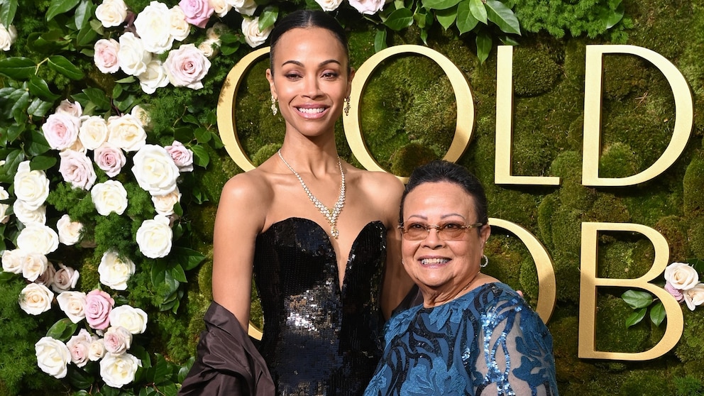 Zoe Saldaña walks the Golden Globes red carpet with mom, wins for