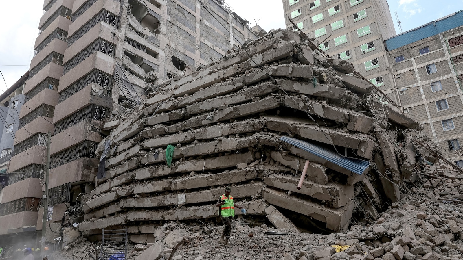Many feared trapped as a tall building collapses in Kenya