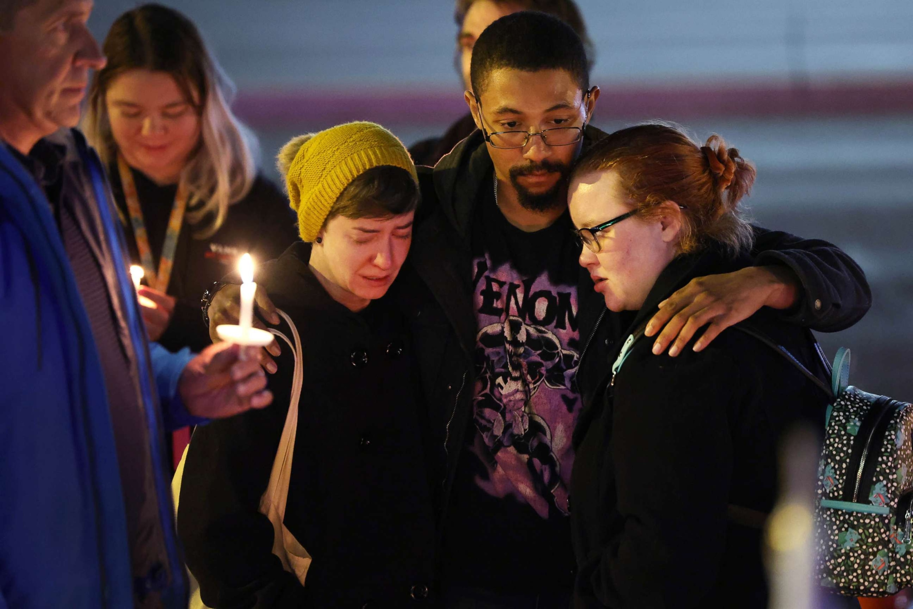 PHOTO: People hold a vigil at a makeshift memorial near the Club Q nightclub on Nov. 20, 2022 in Colorado Springs, Colorado.