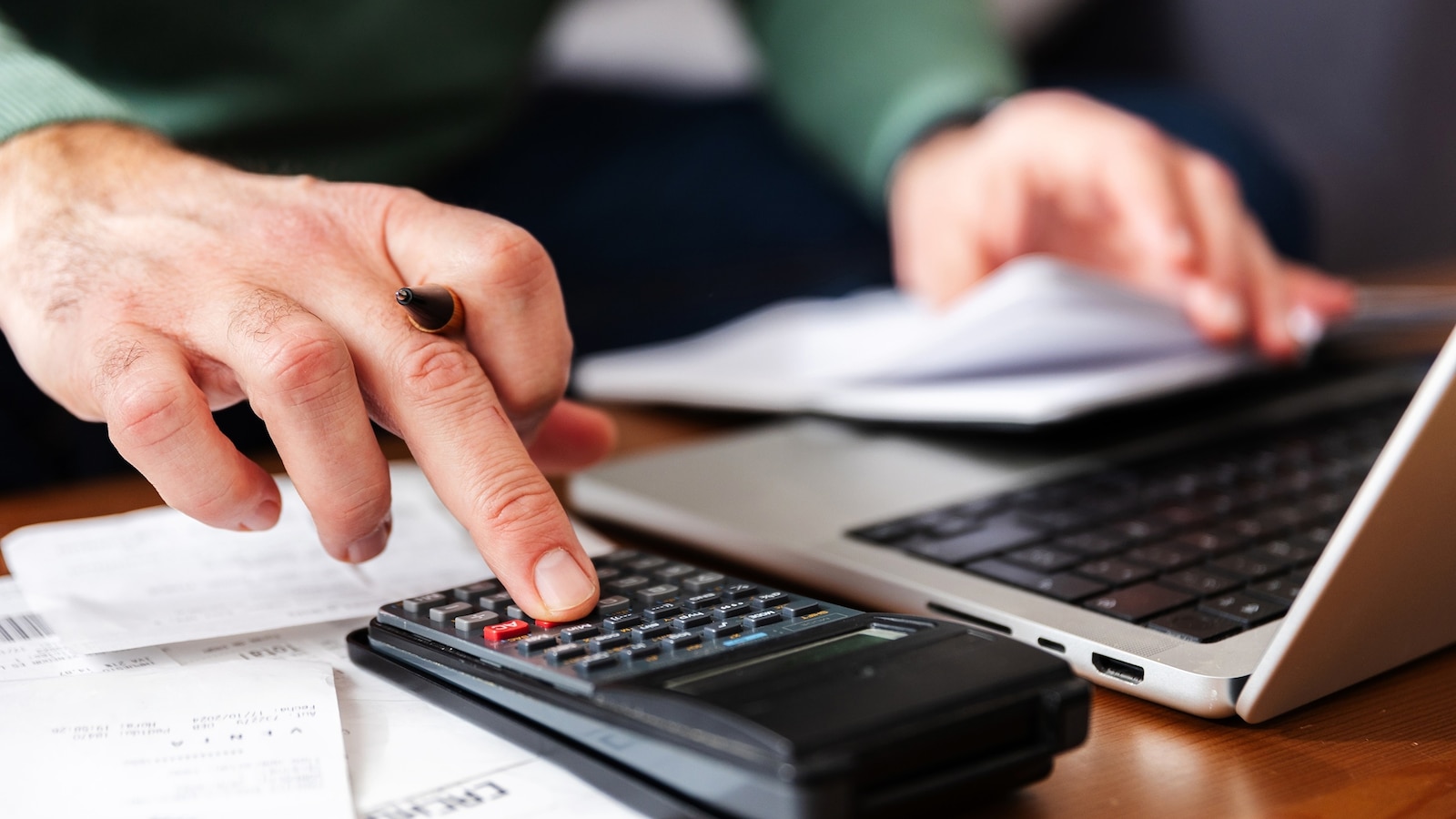 Stock photo of a person handling their finances.