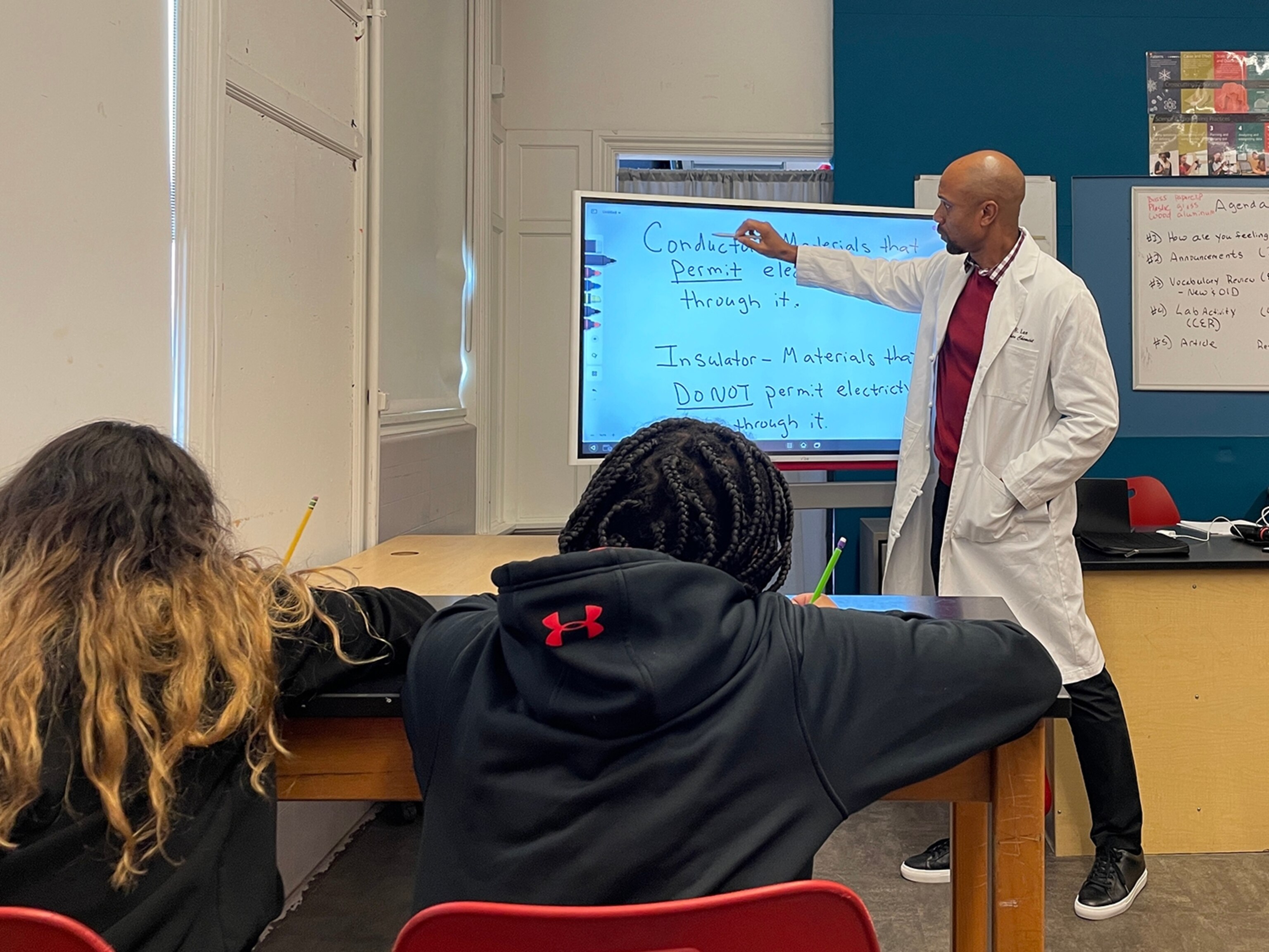 PHOTO: 5th grade STEM Teacher Jonté Lee teaches his students about electrical conductors and insulators.