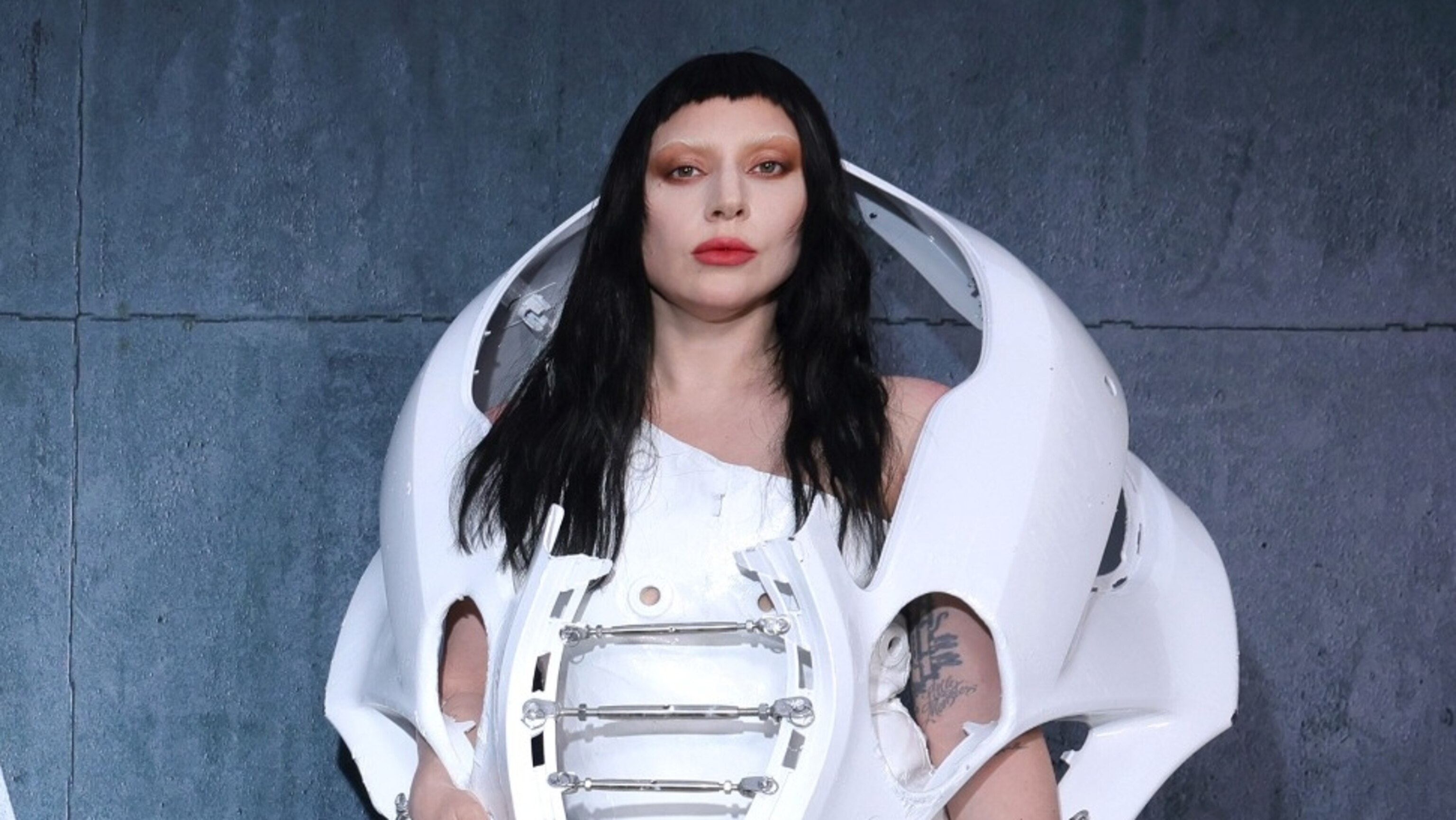 Lady Gaga hits the red carpet in head-turning car part ensemble