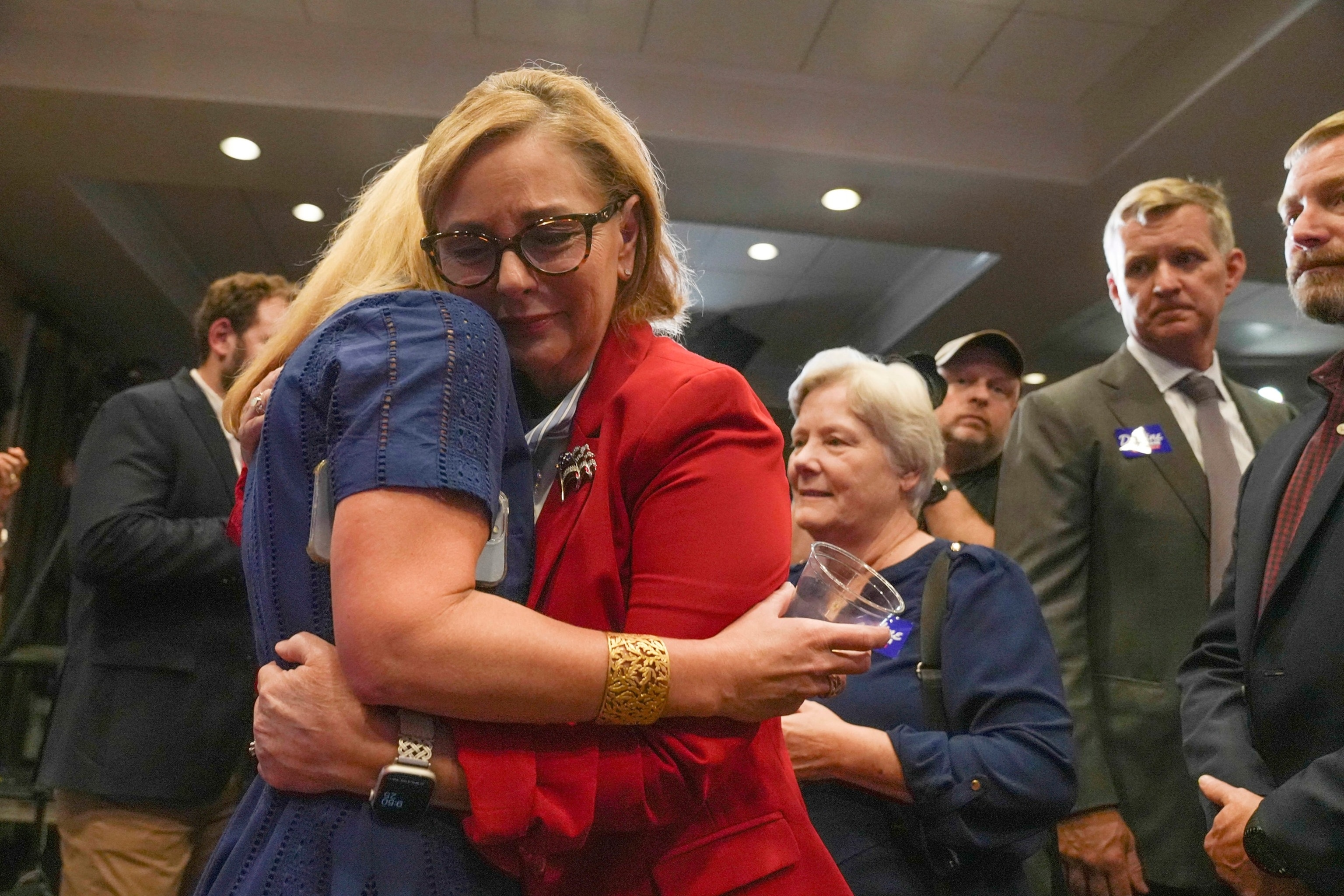 PHOTO: Sen. Darline Graham gets emotional while hugging Tara Spicer, her finance director, after winning a special Republican primary runoff to replace her brother, the late Sen. Lindsey Graham, in the general election, Aug. 25, 2026, in Columbia, S.C. 