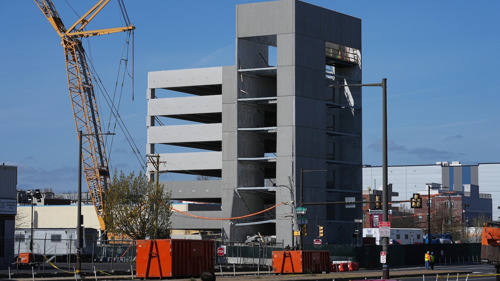Bodies of 2 workers found days after partial collapse at parking garage