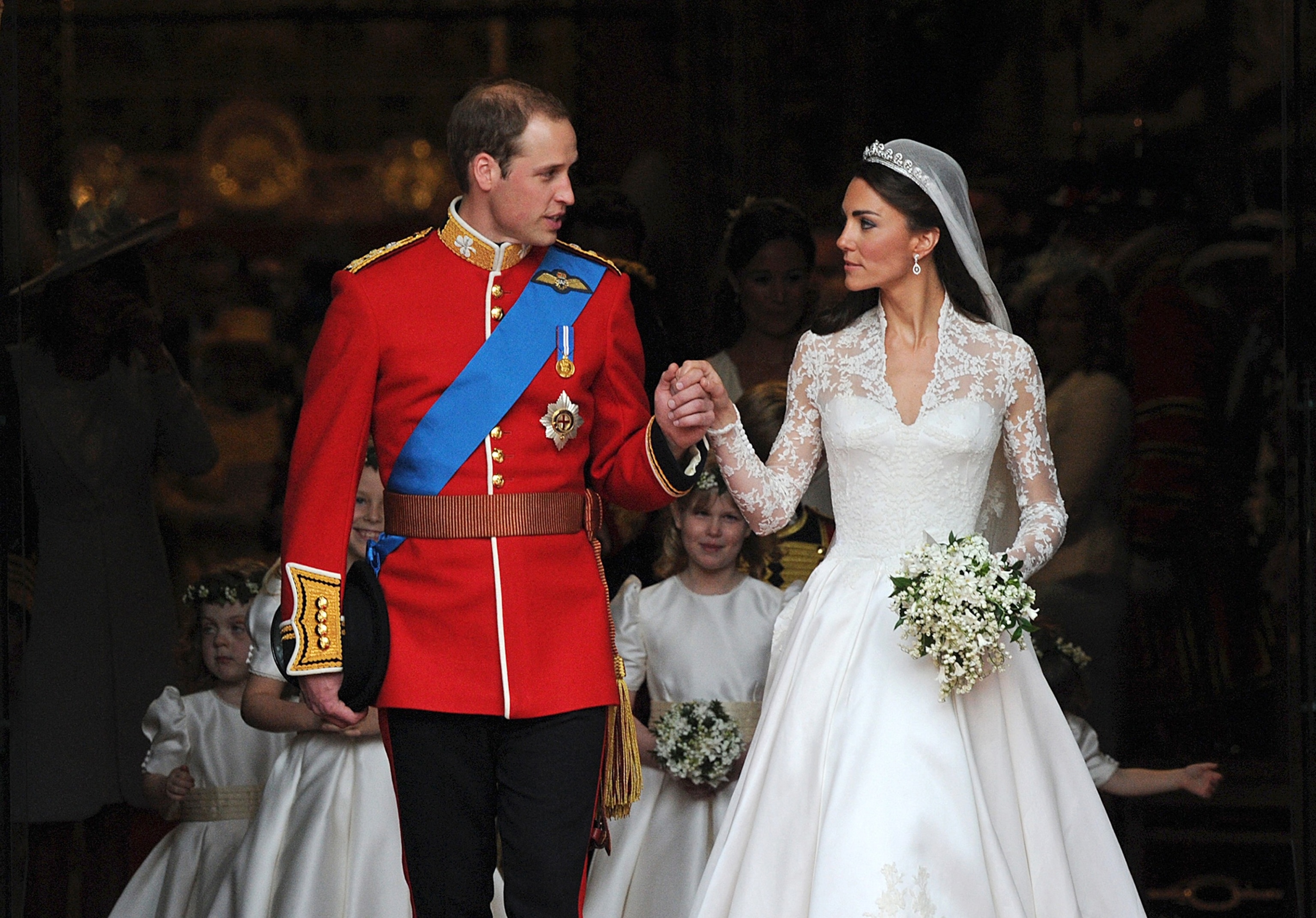 PHOTO: Britain's Prince William and his wife Kate, Duchess of Cambridge, come out of Westminster Abbey following their wedding ceremony, in London, April 29, 2011.