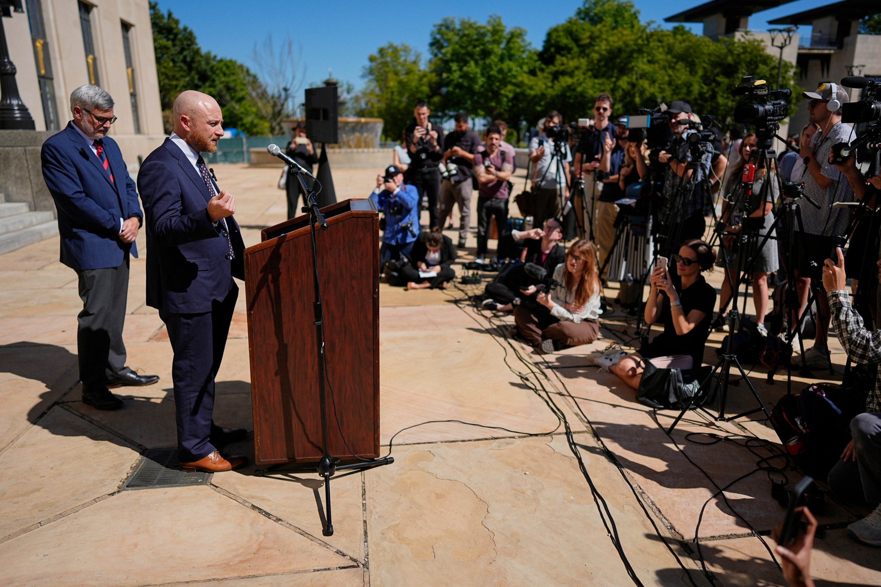 PHOTO: Christa Pike's attorney's Luke Ihnen, center, and Randy Spivey, left, hold news conference after a court hearing Oct. 7, 2026, in Nashville, Tenn.