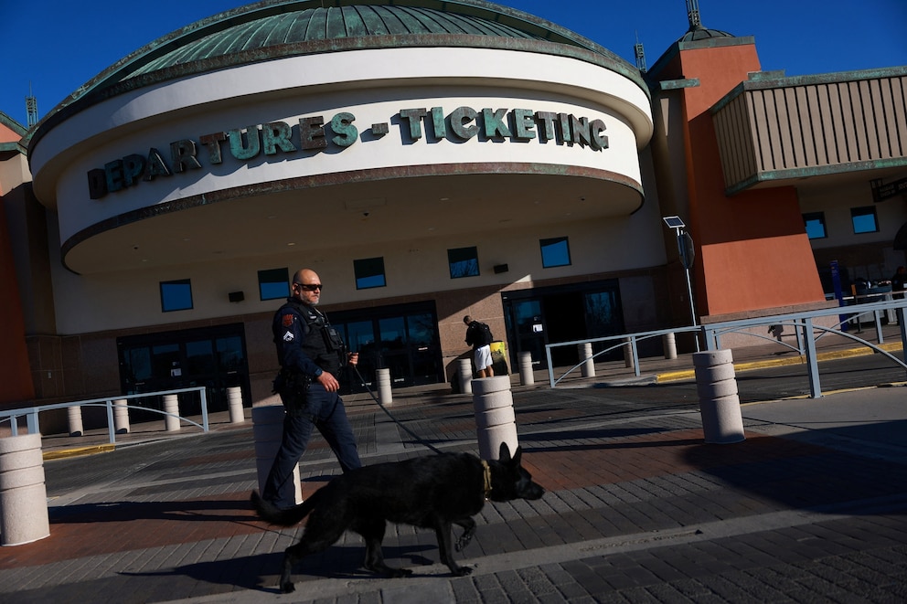 PHOTO: A police officer walks with a K9 police dog at El Paso International Airport, after the Federal Aviation Administration lifted its temporary closure of the airspace over El Paso in El Paso, Texas, Feb. 11, 2026. 