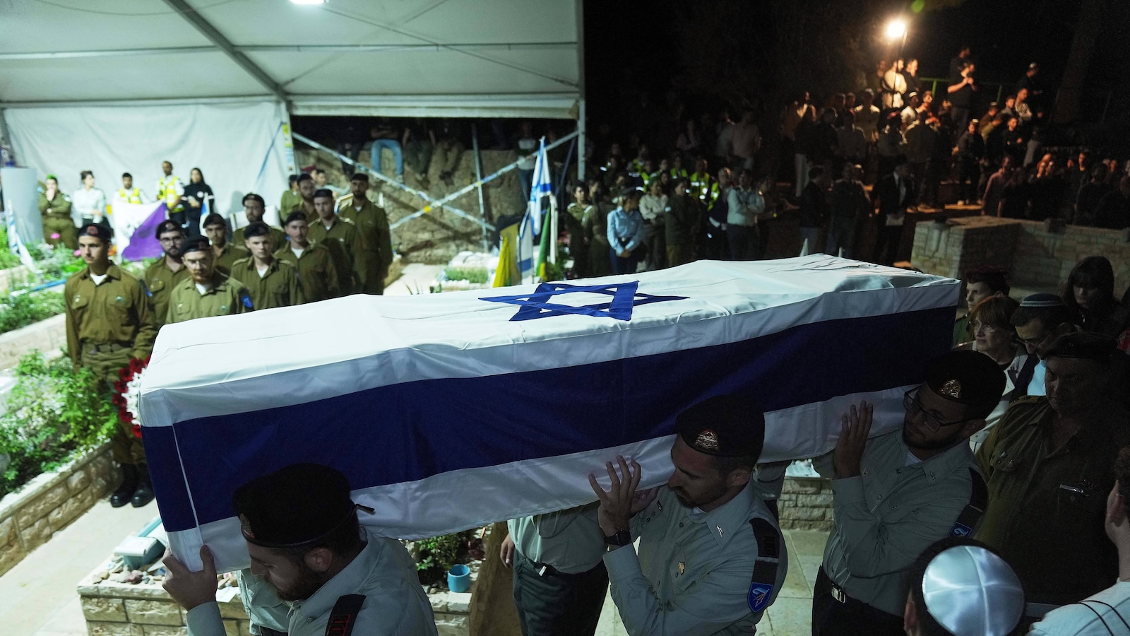 Just-released hostage attends funeral of fellow soldier, whose body was among few returned from Gaza