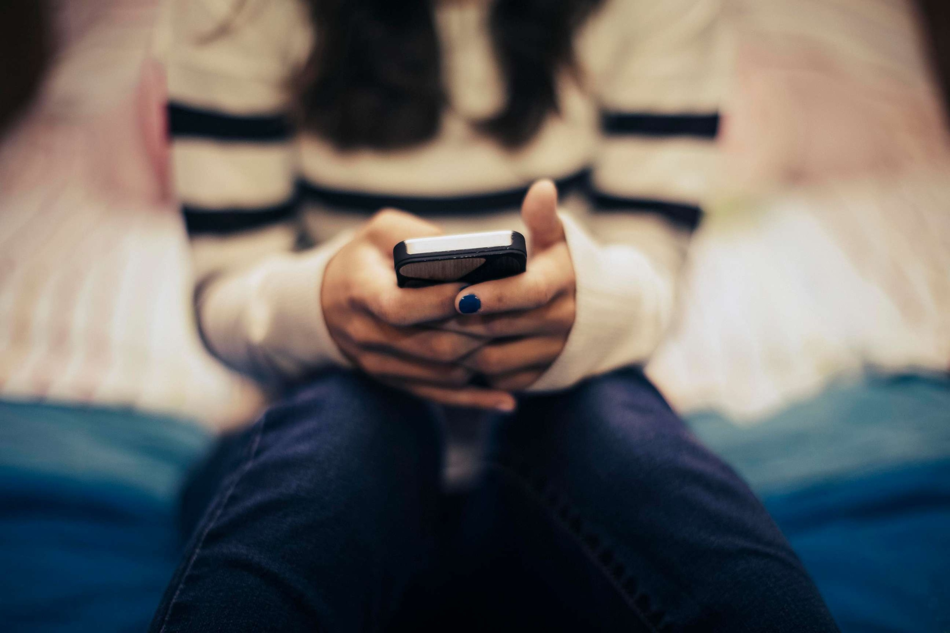 PHOTO: A woman is seen using her phone in this undated stock image.