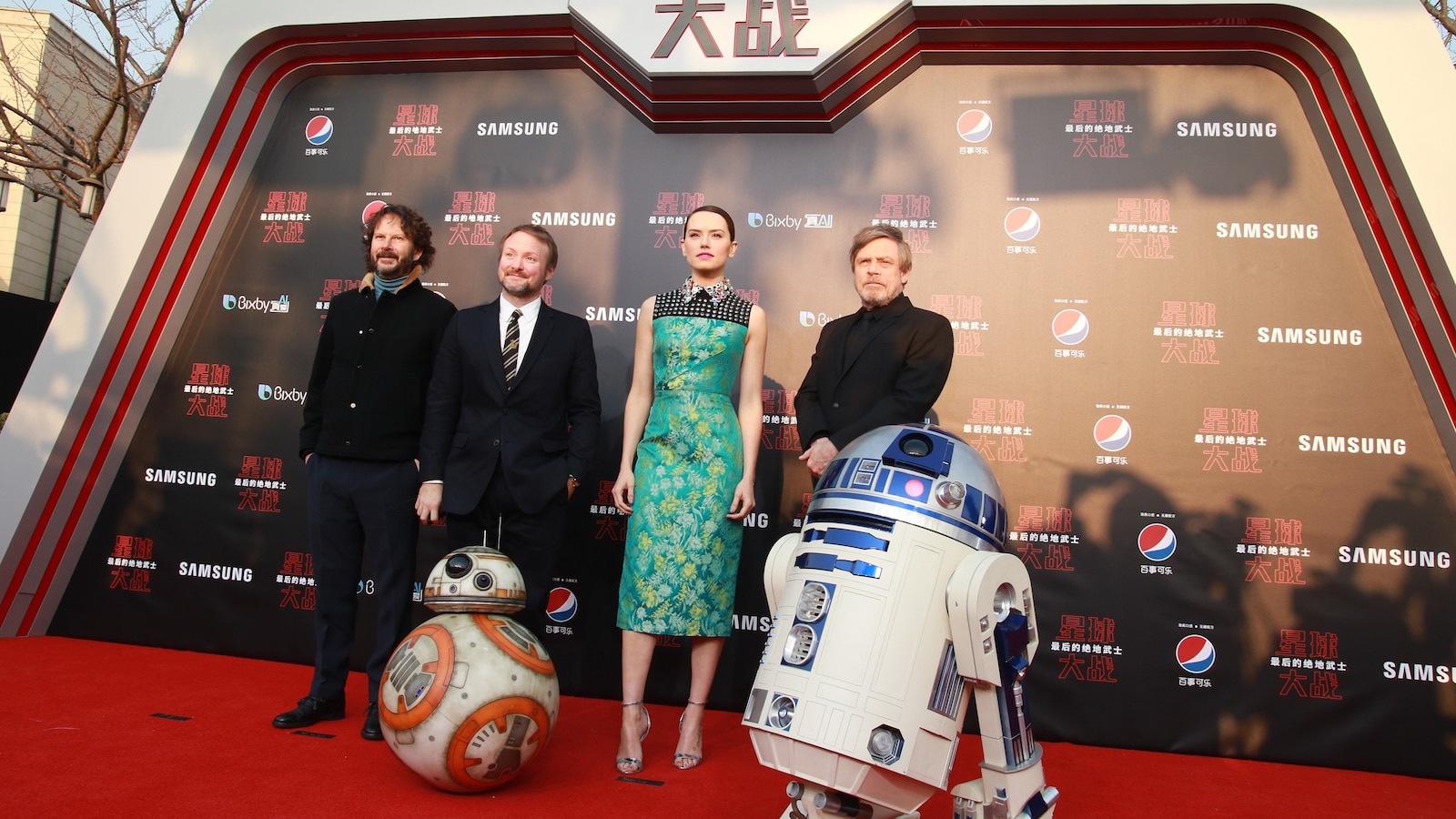Producer Ram Bergman, director Rian Johnson, actress Daisy Ridley and actor Mark Hamill arrive at the premiere of film 'Star Wars: The Last Jedi' at Shanghai Disney Resort, December 20, 2017 in Shanghai, China. 
