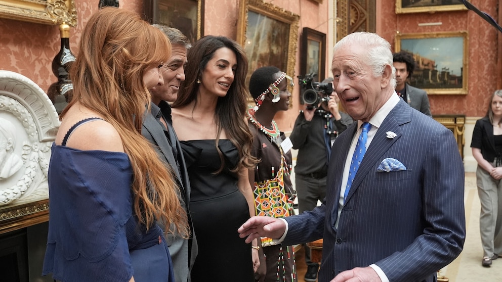 King Charles III greets George and Amal Clooney at Buckingham Palace: See the photos