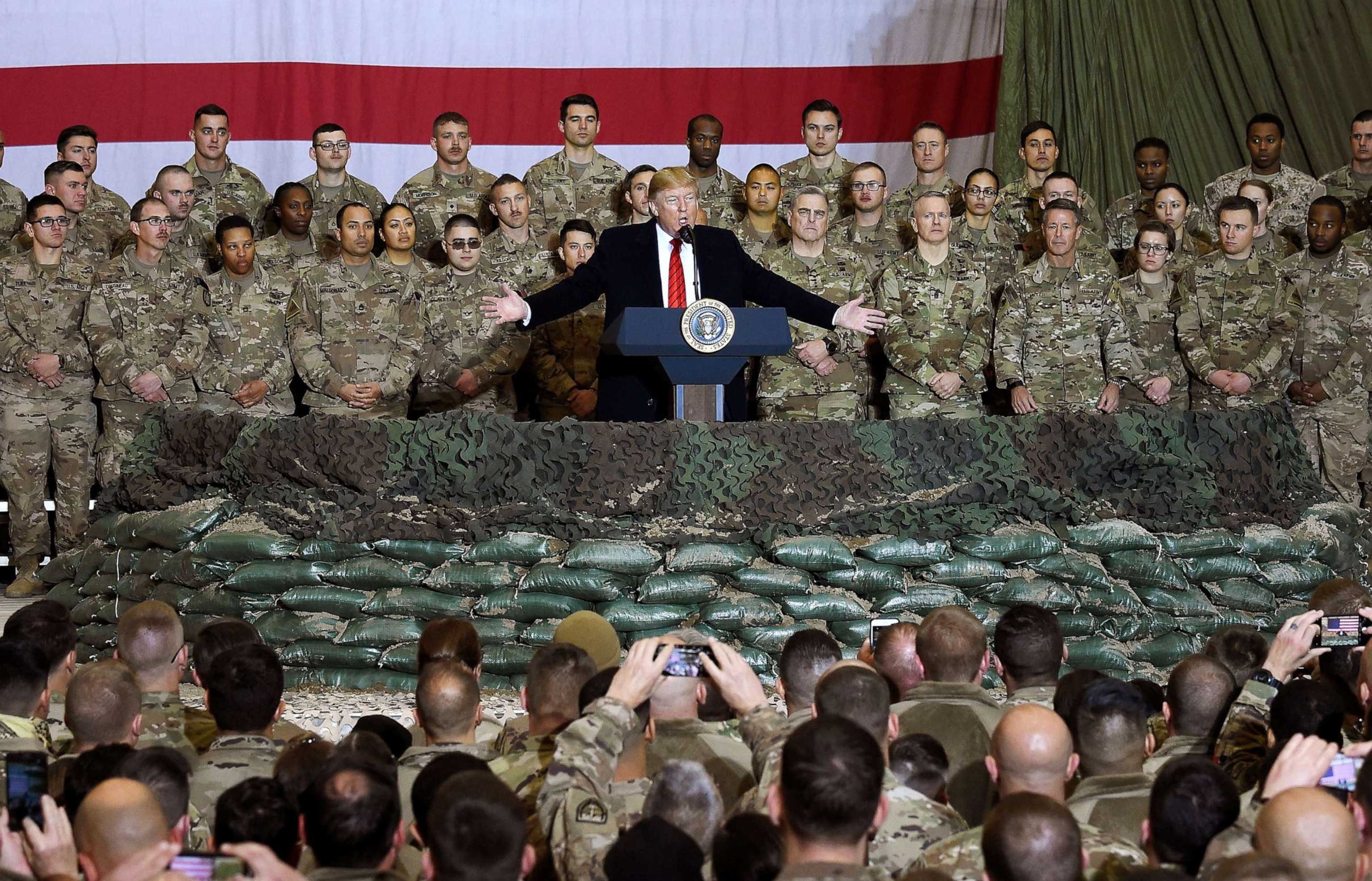 PHOTO: In this Nov. 28, 2019, file photo, President Donald Trump speaks to the troops during a surprise Thanksgiving day visit to Bagram Air Field in Afghanistan.