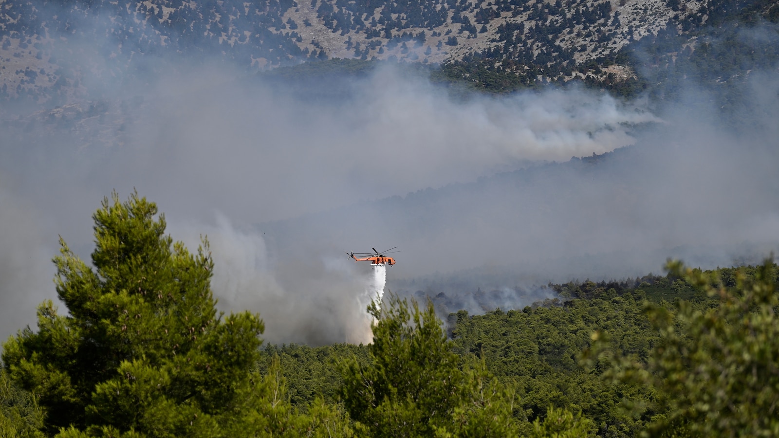 2 killed when firefighting helicopters collide near Athens as Europe’s wildfire emergency rages
